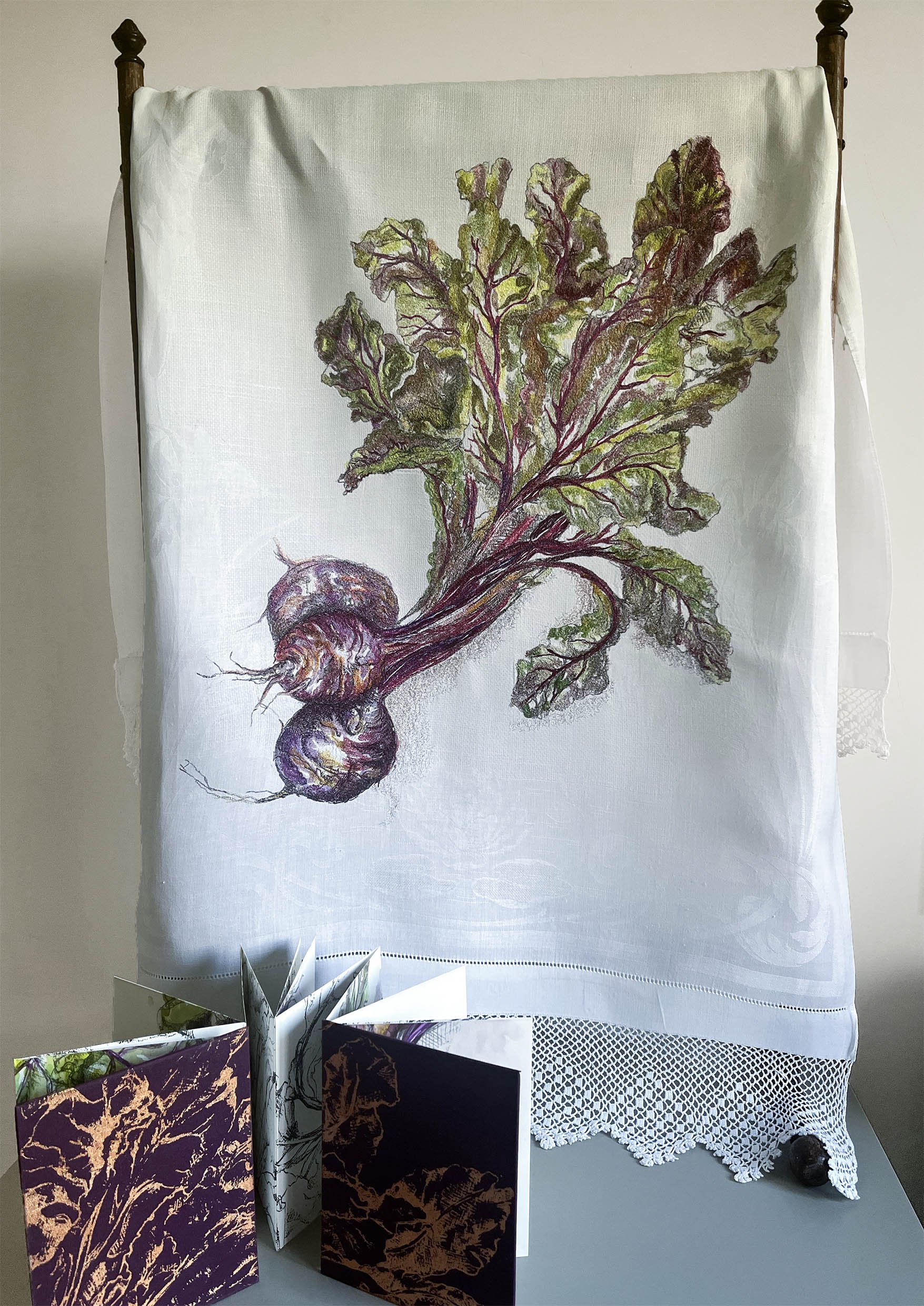 'Repast' & 'Recipe' displayed together - Freehand machine embroidery on found textile displayed on found airer.