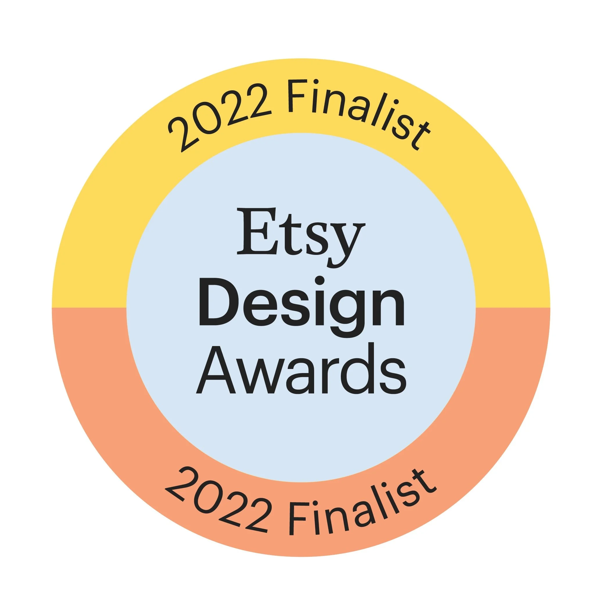 Etsy Design Awards 2022 finalist badge with a circular design, featuring a light blue center and gold and peach outer rings, and black text.