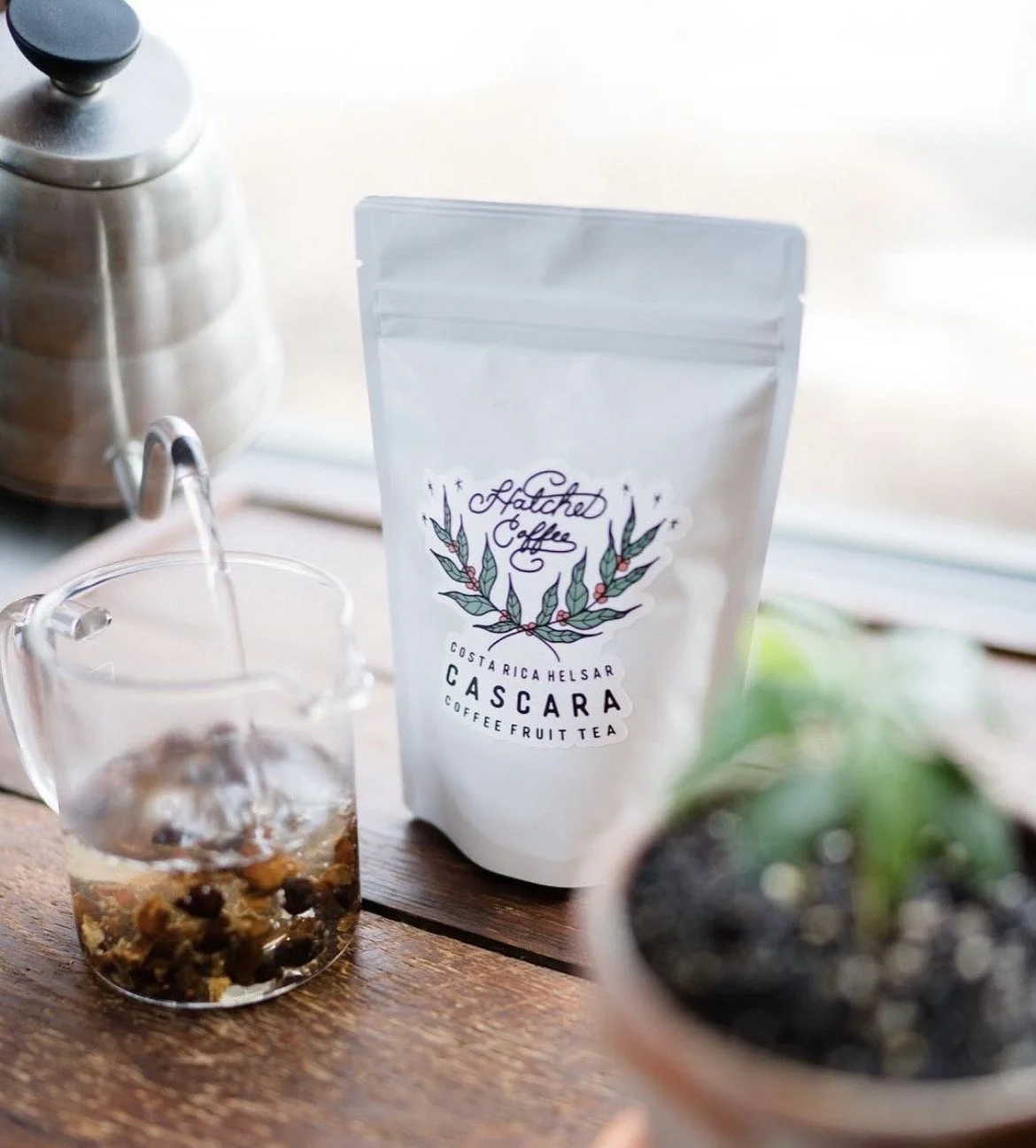 Small label for Hatchet Coffee, lettering and illustration