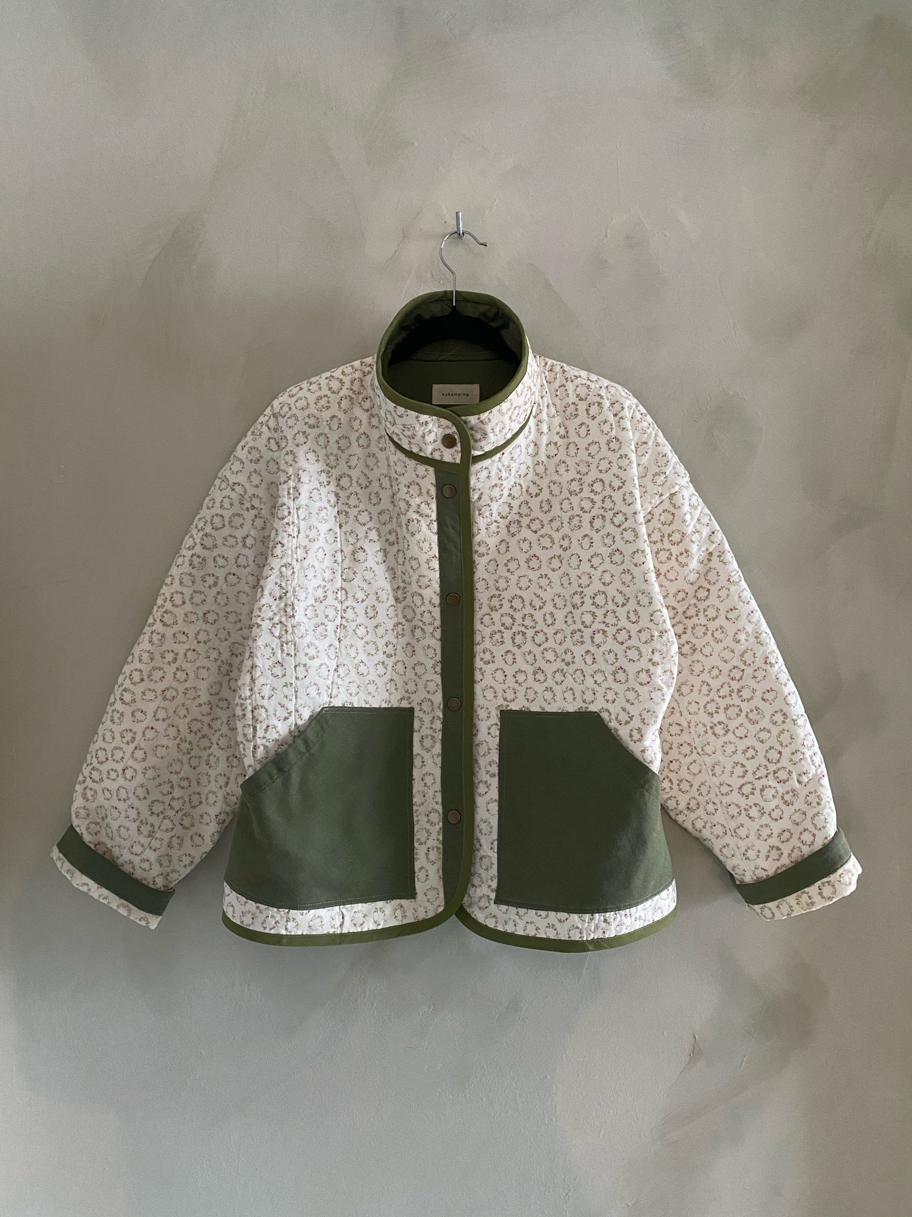 cropped jacket in wreaths