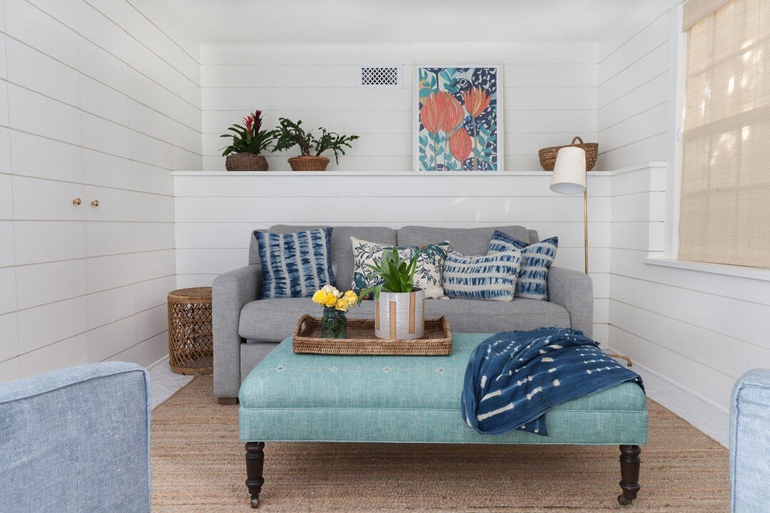 A cheery spot to celebrate warmer weather! We adorned this pool house with gorgeous vintage African fabrics for a space reflective of vivid blue waters and calming waves.

The perfect place to dry off after a day spent splashing in the water and maki