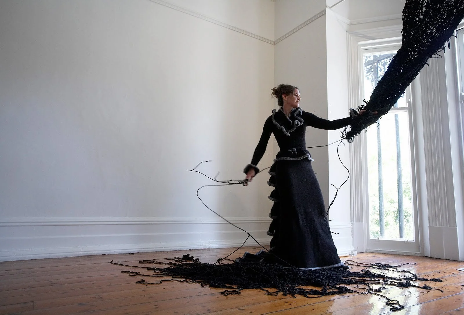 Martha McDonald performing in knitted costume