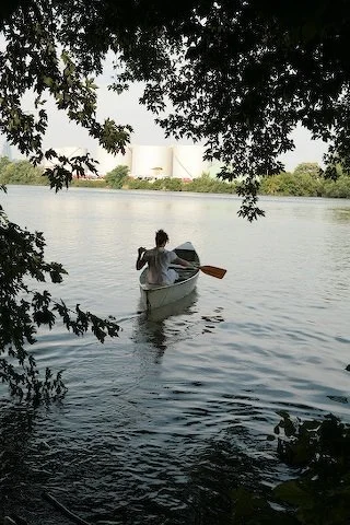Artist in canoe at John Bartram's garden