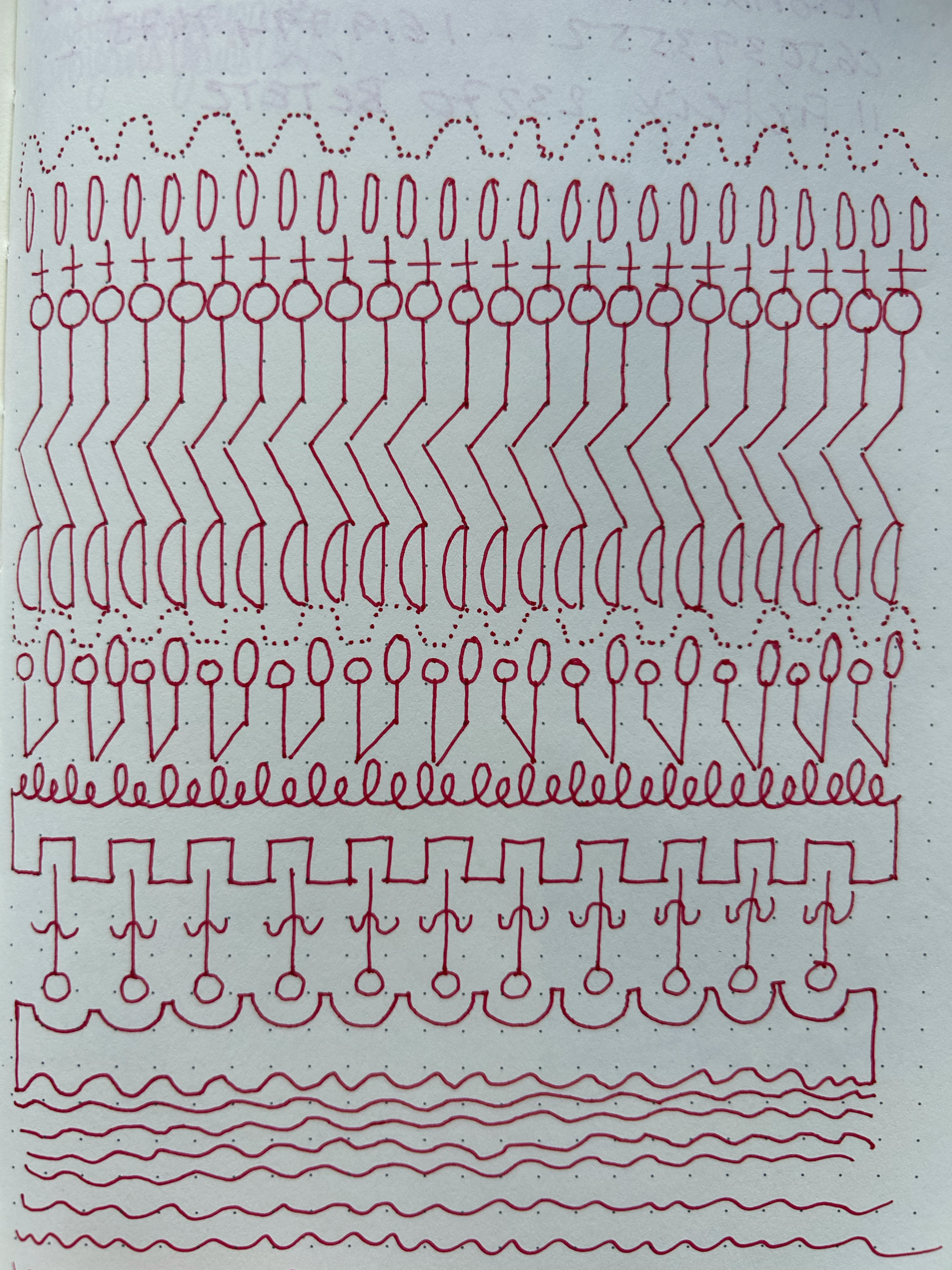 A collection of various red embroidery stitches on fabric, including zigzag, chain, and wave patterns.