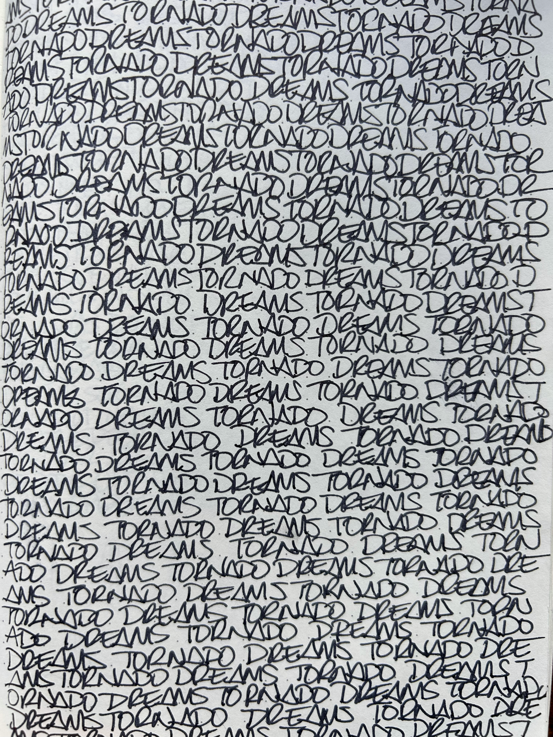 A handwritten note with the repeated phrase 'DREAMS TO LAND.'