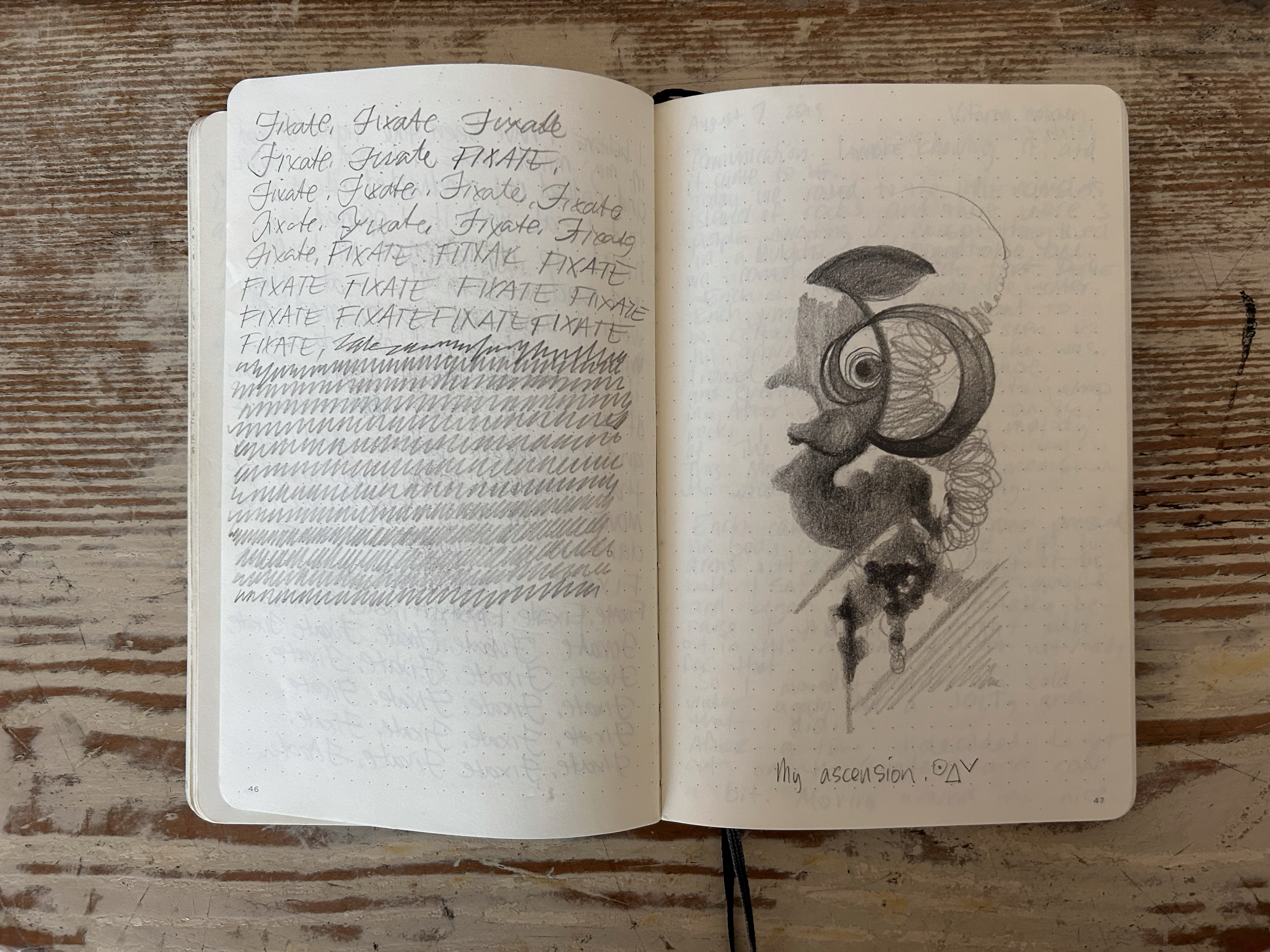 An open notebook on a wooden surface. The left page contains handwritten notes and repetitive text, and the right page has a detailed pencil drawing of a surreal creature with a spiral eye, cloudy form, and abstract shapes. The bottom of the right pa