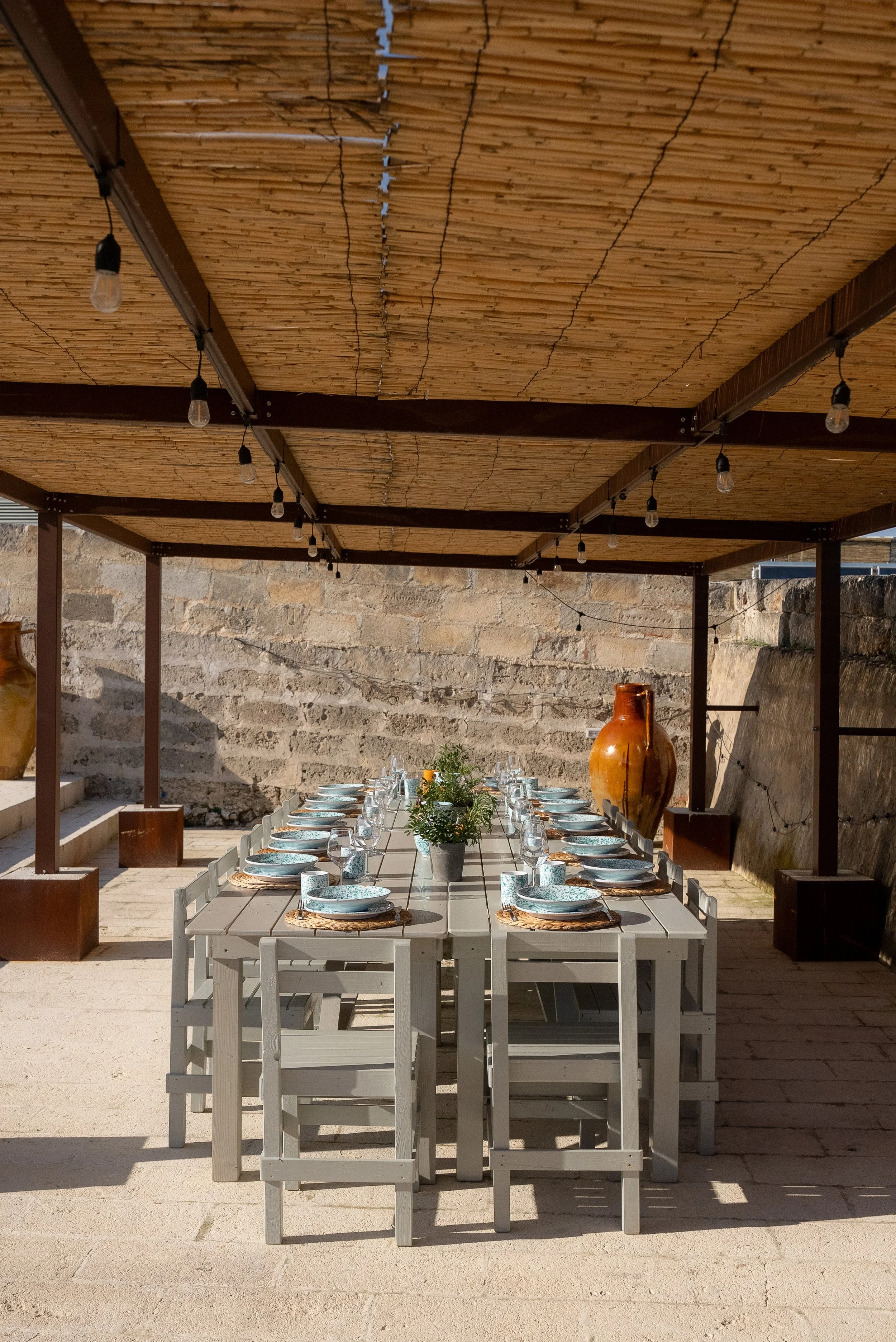 Rustic outdoor table setting showcasing authentic Italian retreat experience