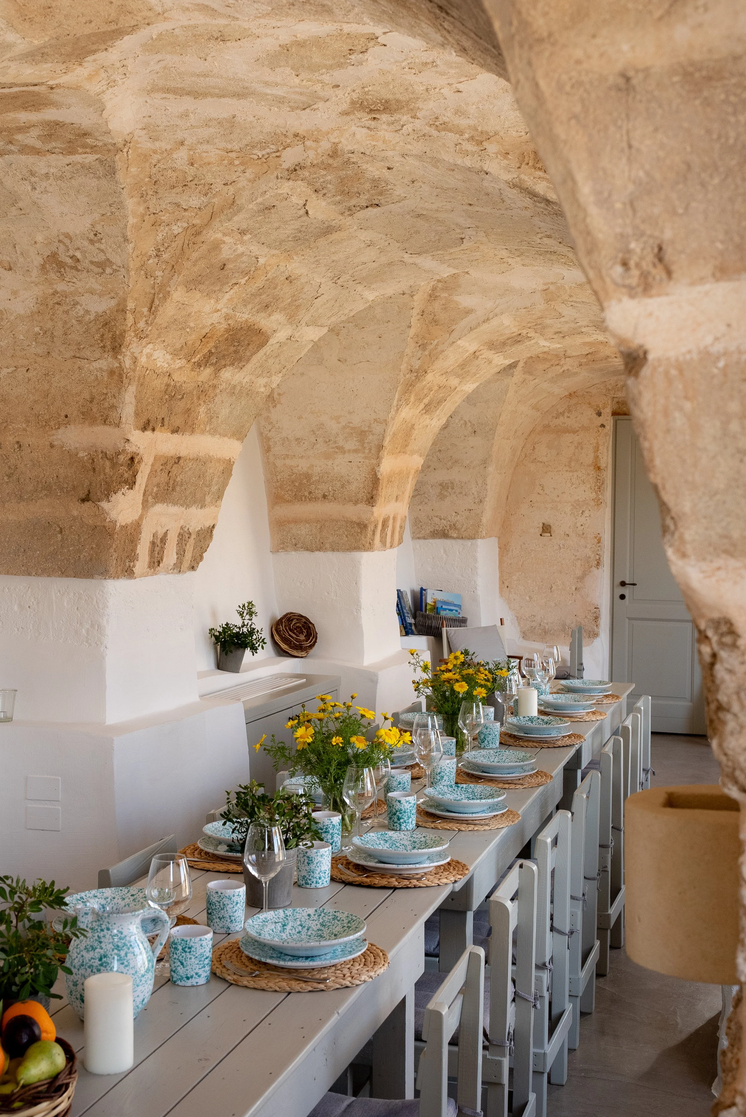 Rustic tableware and details reflecting authentic Puglian cuisine at retreat venue