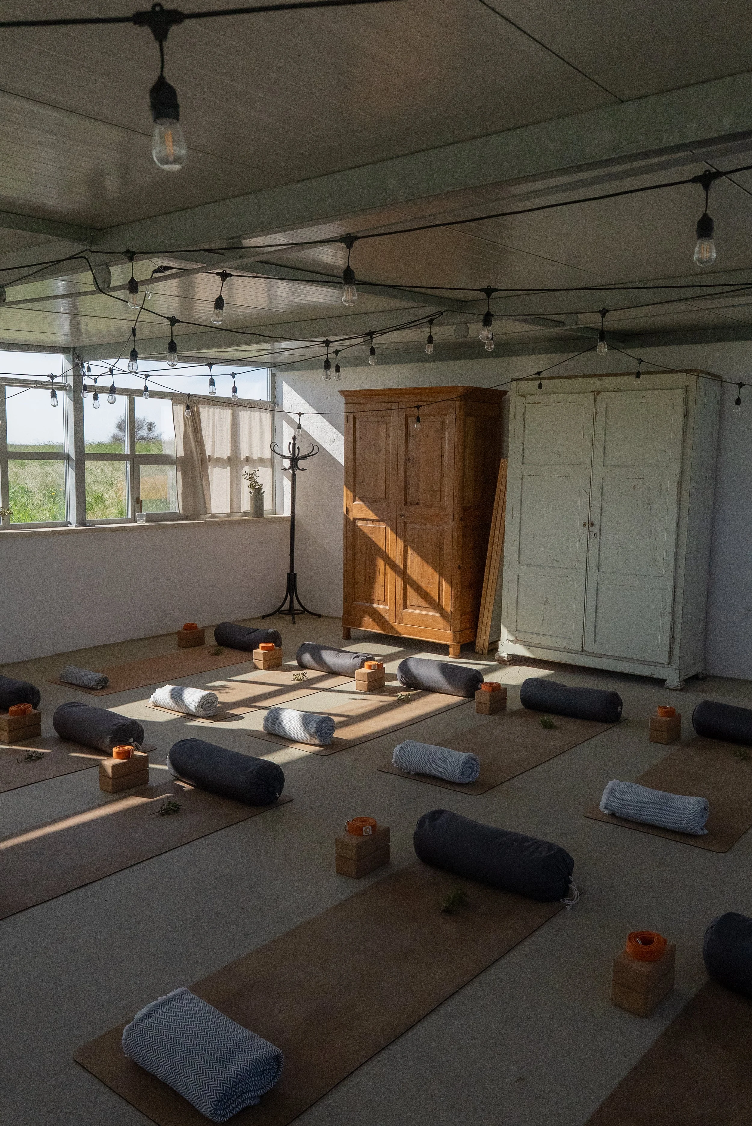 Serene yoga and meditation space at wellness retreat venue in Italy