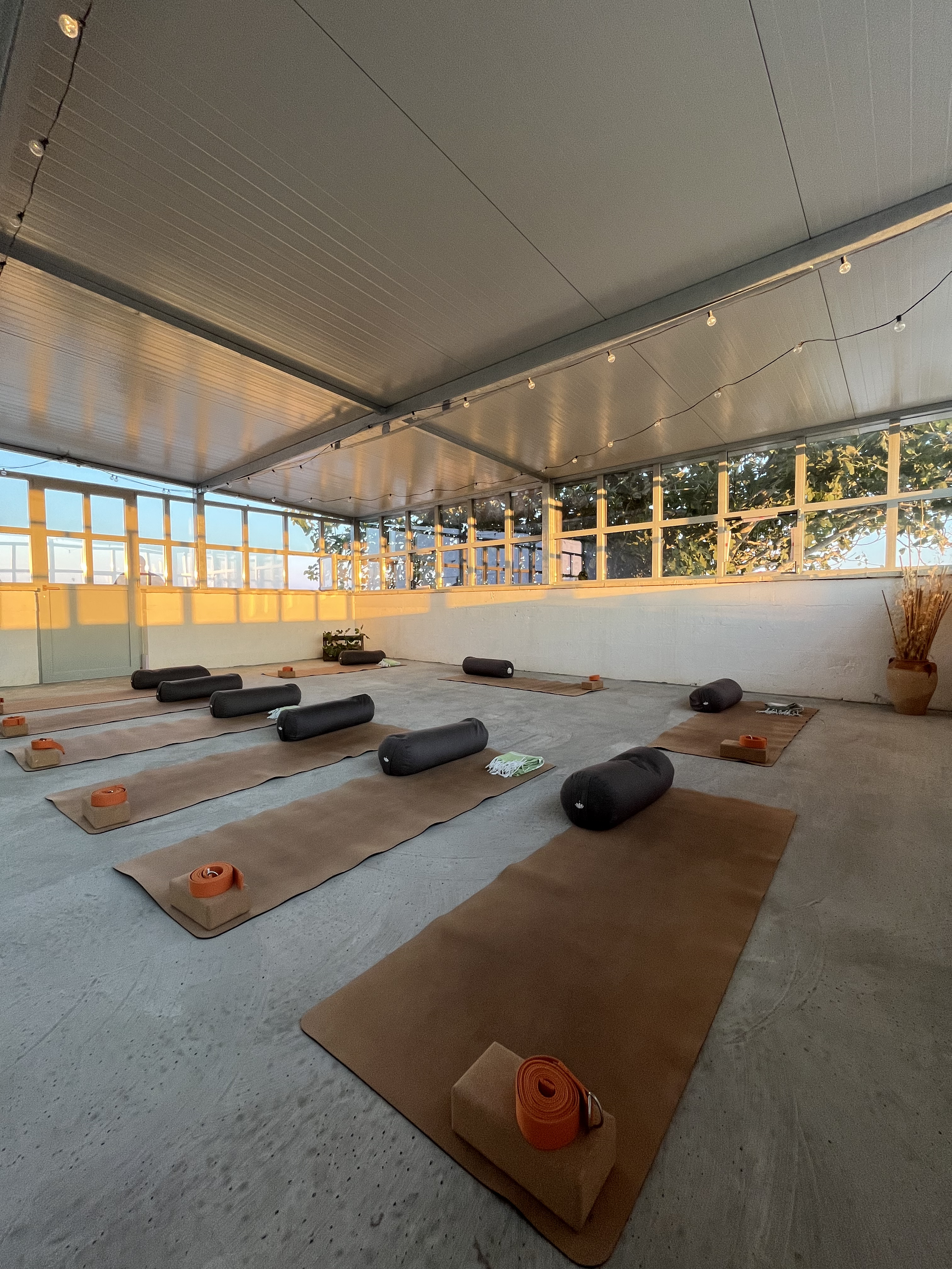 Serene yoga space at Masseria Specula featuring soft light, natural materials, and a tranquil atmosphere designed for mindfulness and relaxation