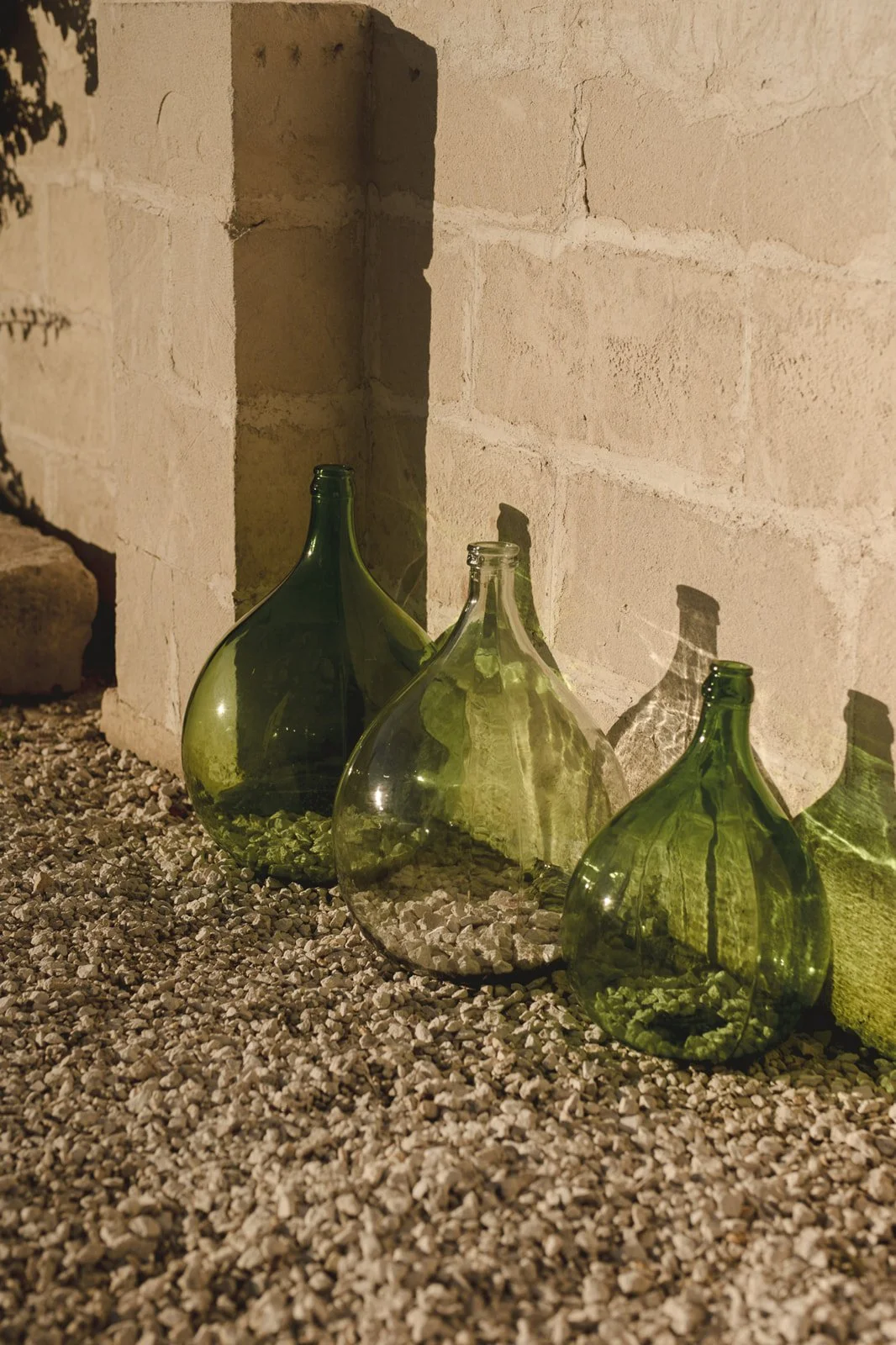 Stone courtyard with gravel pathways at a traditional masseria in Southern Italy
