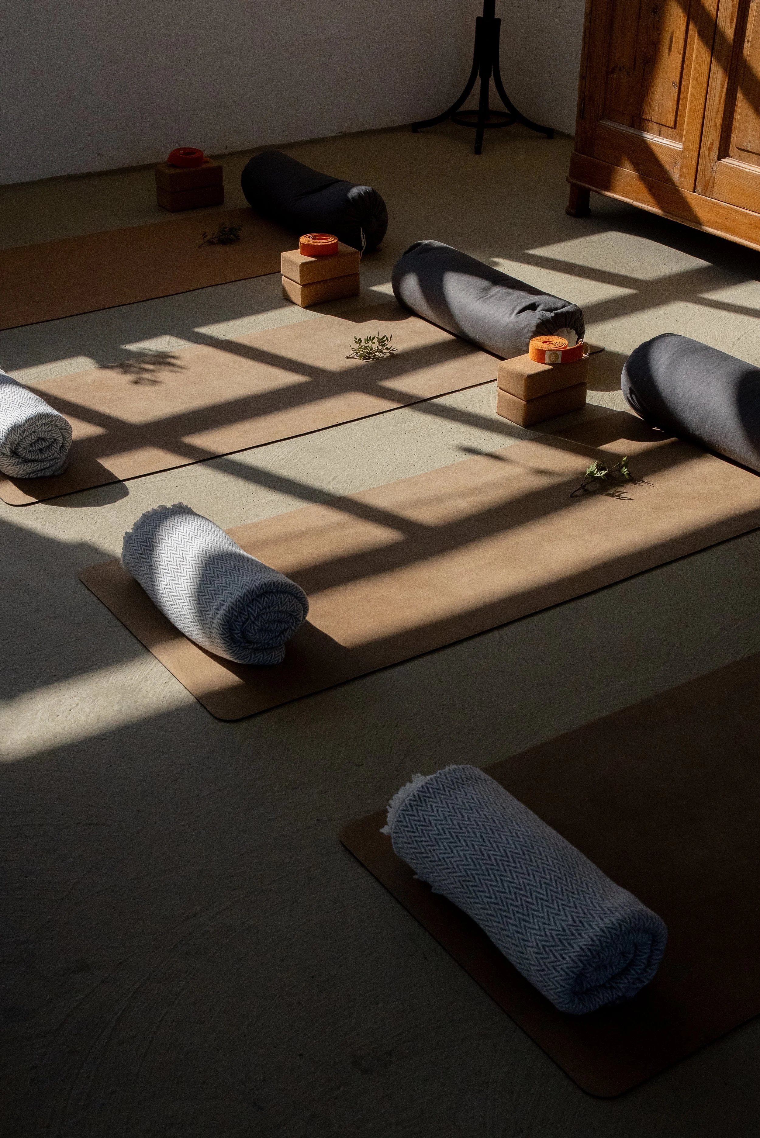 Yoga mats and props arranged for group retreat sessions at Masseria Specula in Puglia