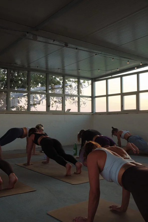 Retreat room and yoga shala equipped with mats, blocks, straps, blankets and bolsters at our venue in Puglia, Italy