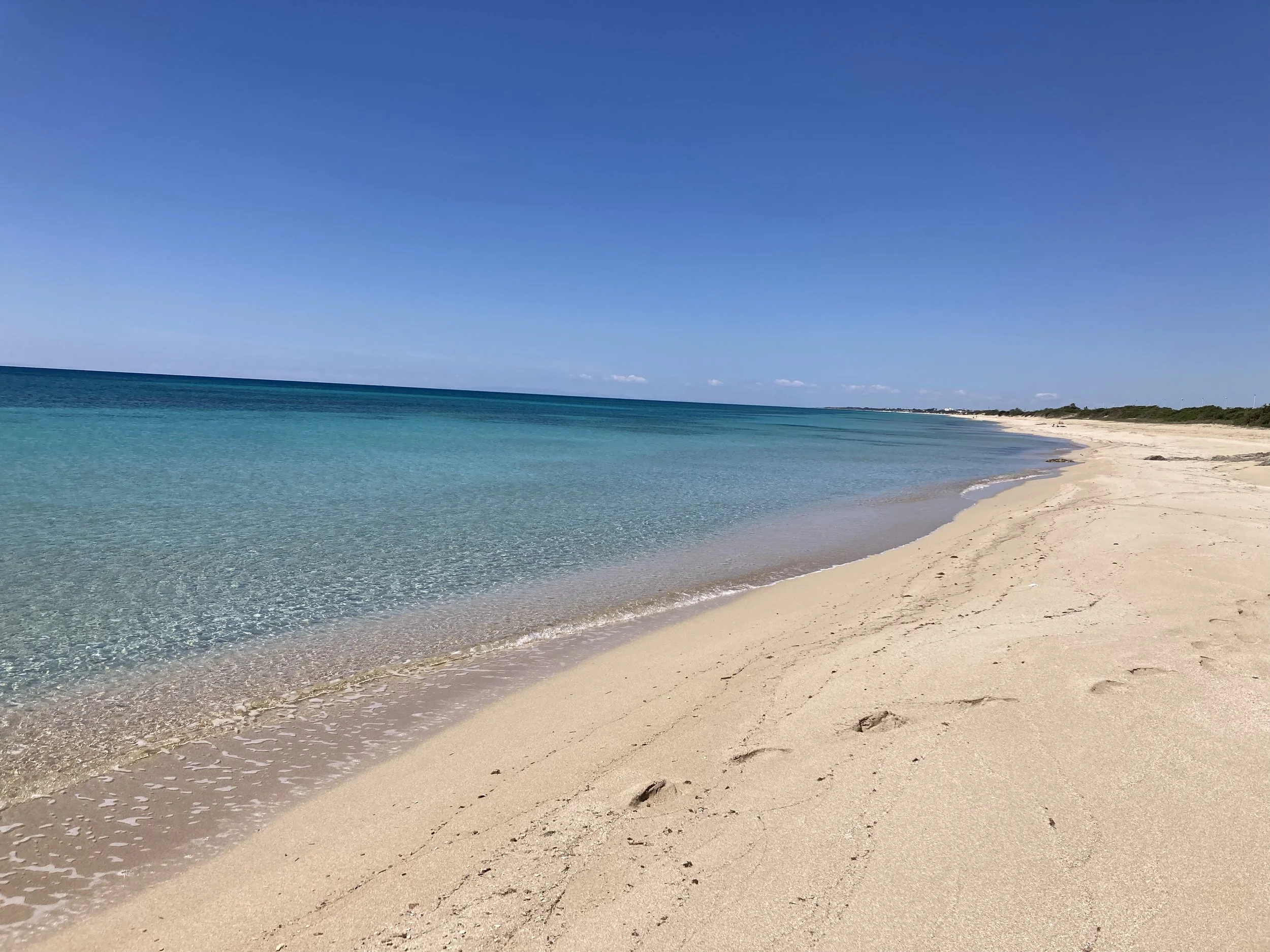 Quiet and unspoiled beach close to Masseria Specula, ideal for relaxation, reflection, and retreat downtime by the sea in Italy