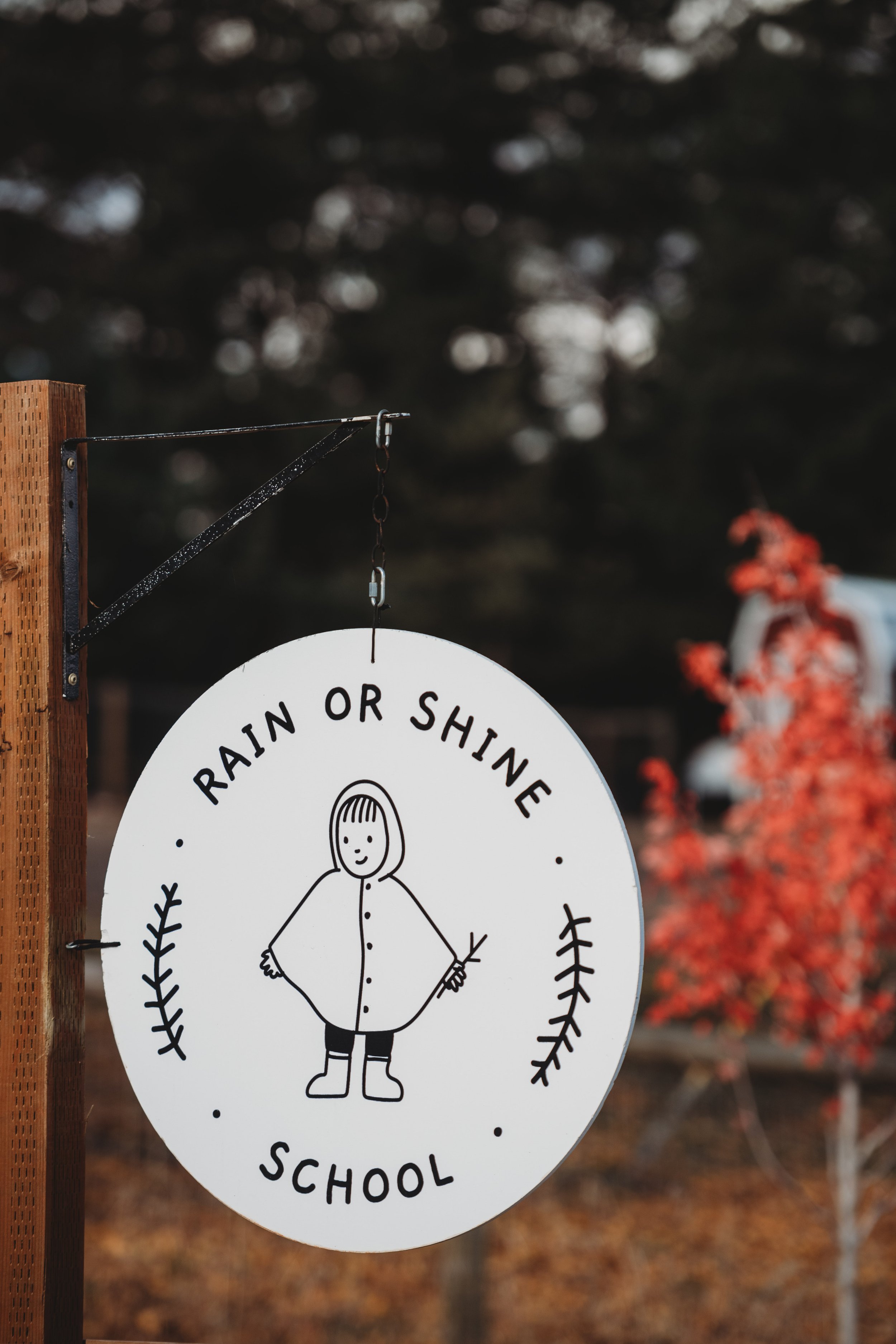 Rain or shine school sign