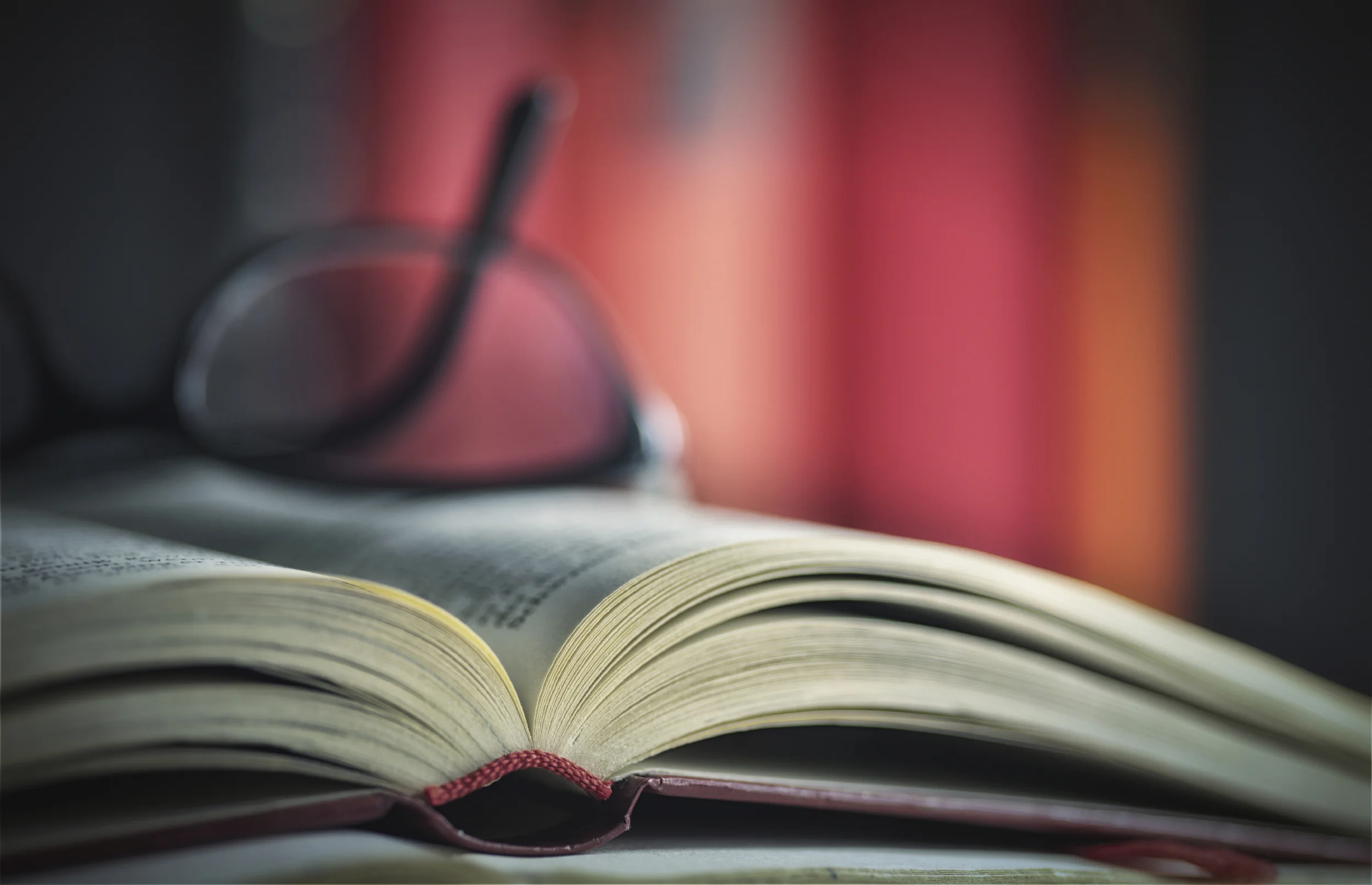 Glasses-are-laying-on-a-book-000054544192_Large.jpg