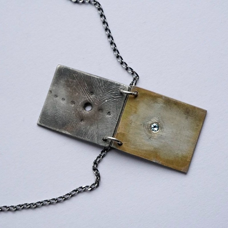 Reckoning+Pendant_3+pages_with+topaz_111_low+res.jpg