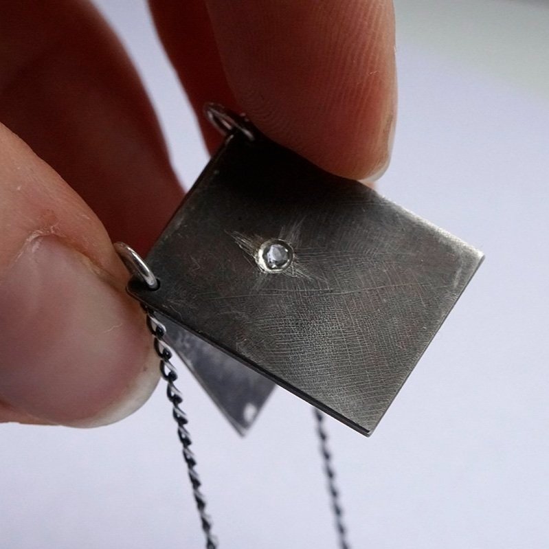 Reckoning+Pendant_2+pages_with+topaz_1_low+res.jpg