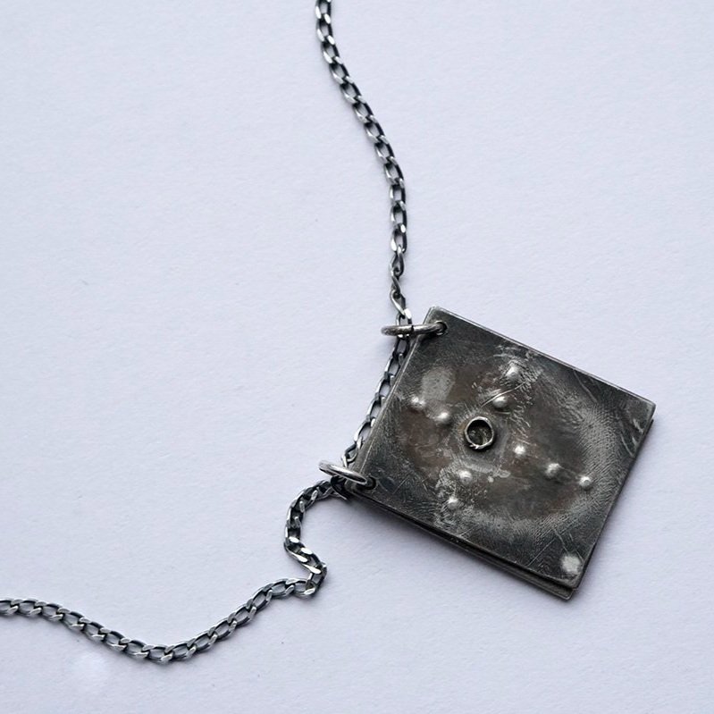 Reckoning+Pendant_2+pages_with+topaz_9_low+res.jpg