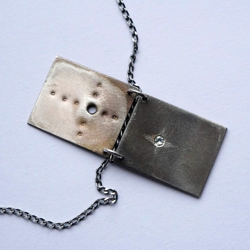 Reckoning+Pendant_2+pages_with+topaz_10_low+res.jpg