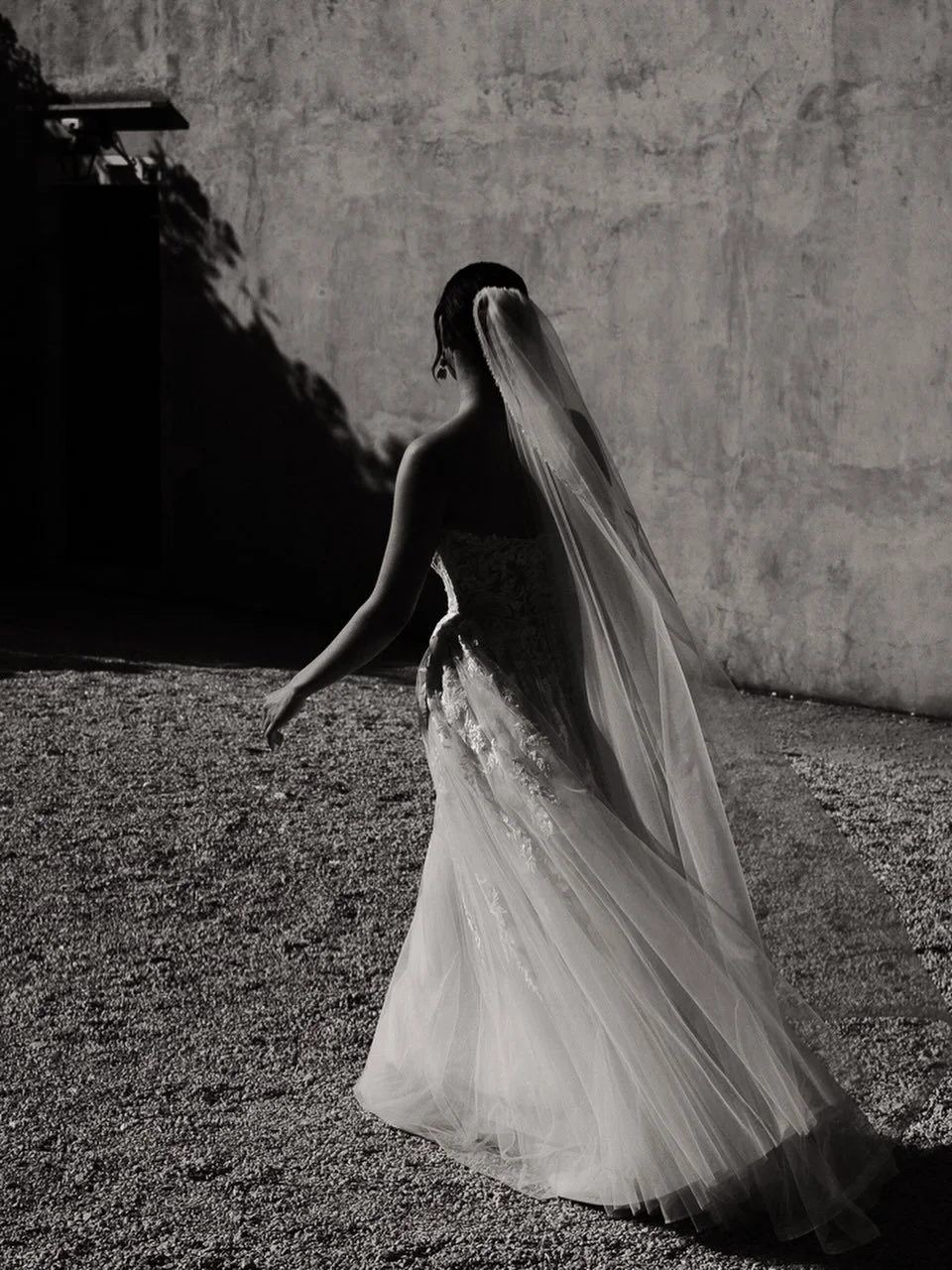 Angles - dress details without the &lsquo;dress on a hanger&rsquo; photo. Love the shadows in this unposed photo of the bride. 

#documentaryweddingphotography #monochrome #blackandwhitephotography #weddingphotography #creteweddings
