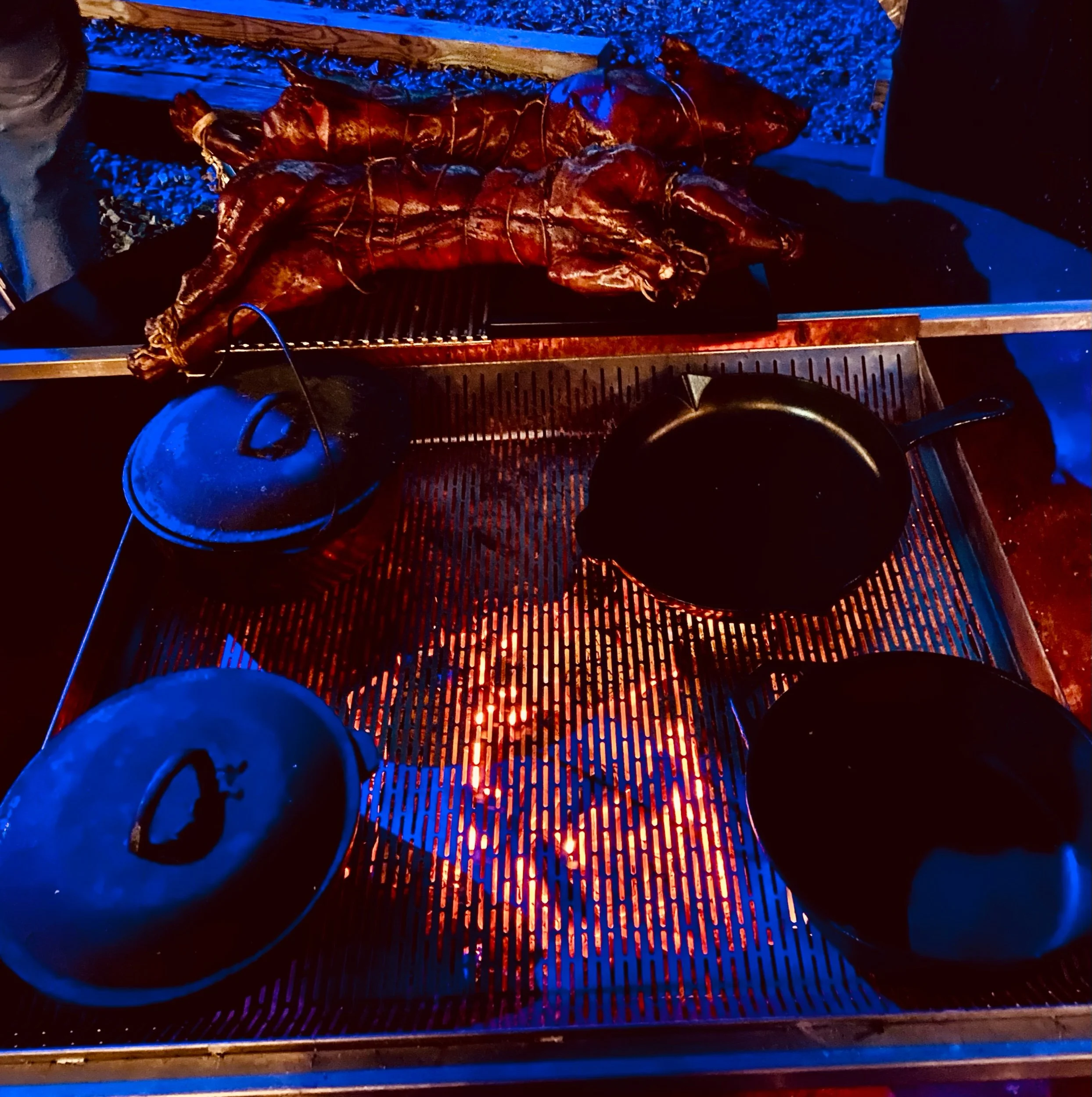 Smoked and flame roasted whole suckling pig porchetta