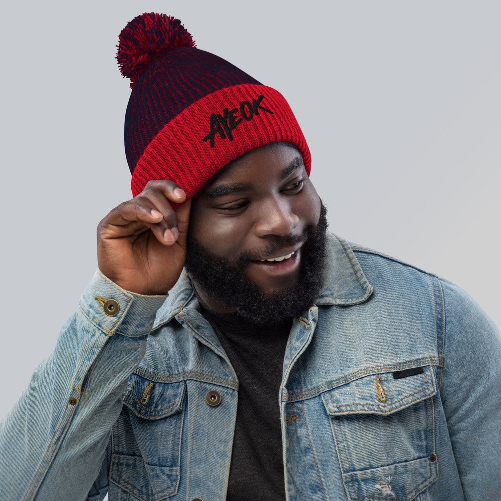 speckled-pom-pom-beanie-navy-red-front-61b4e070f05c0.jpg