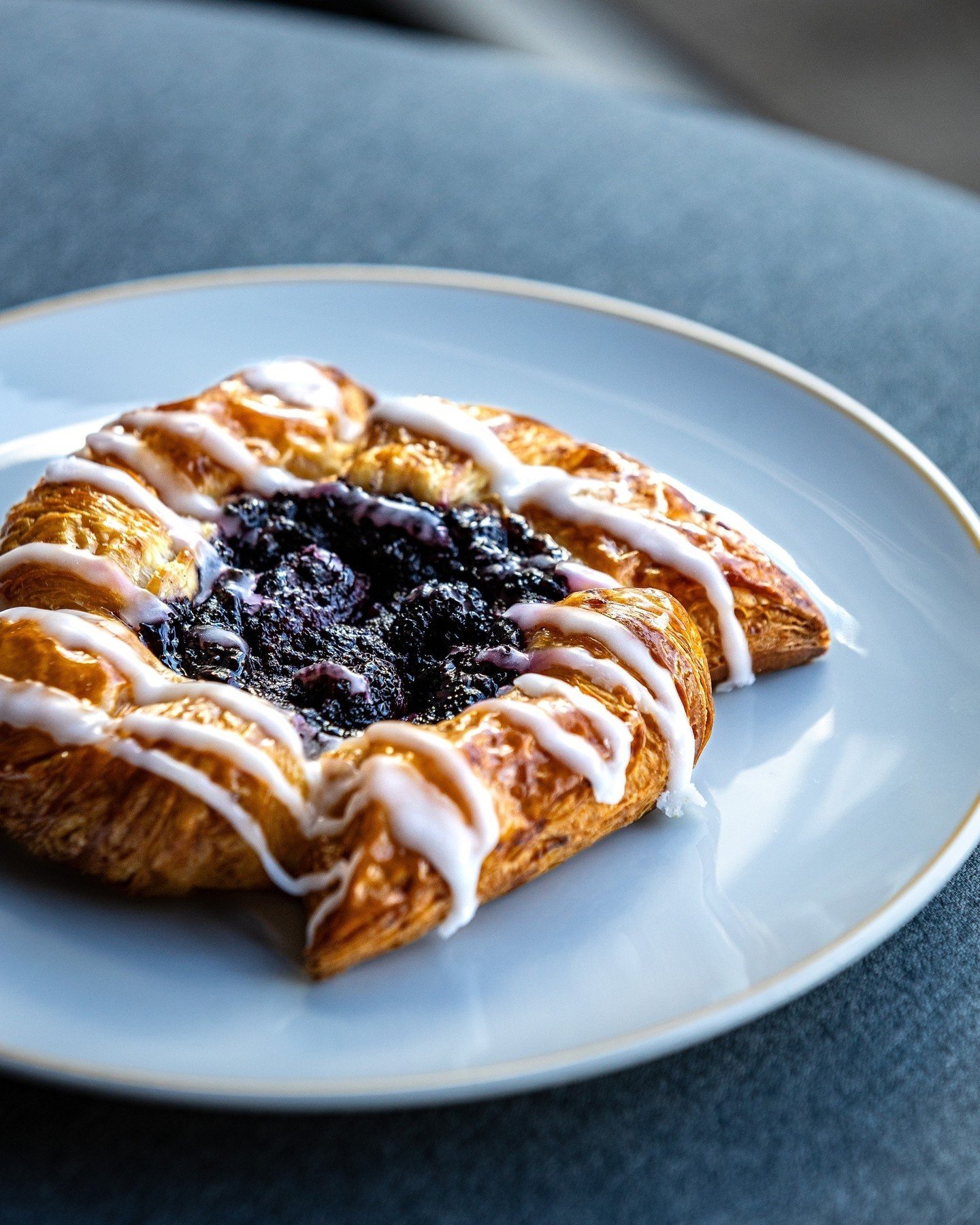 Indulge in a taste of pastry perfection with our Fresh Berry &amp; Cream Cheese Danish ✨ From the buttery layers of pastry to the creamy richness of the Cream Cheese filling and the sweet tang of berries 🫐