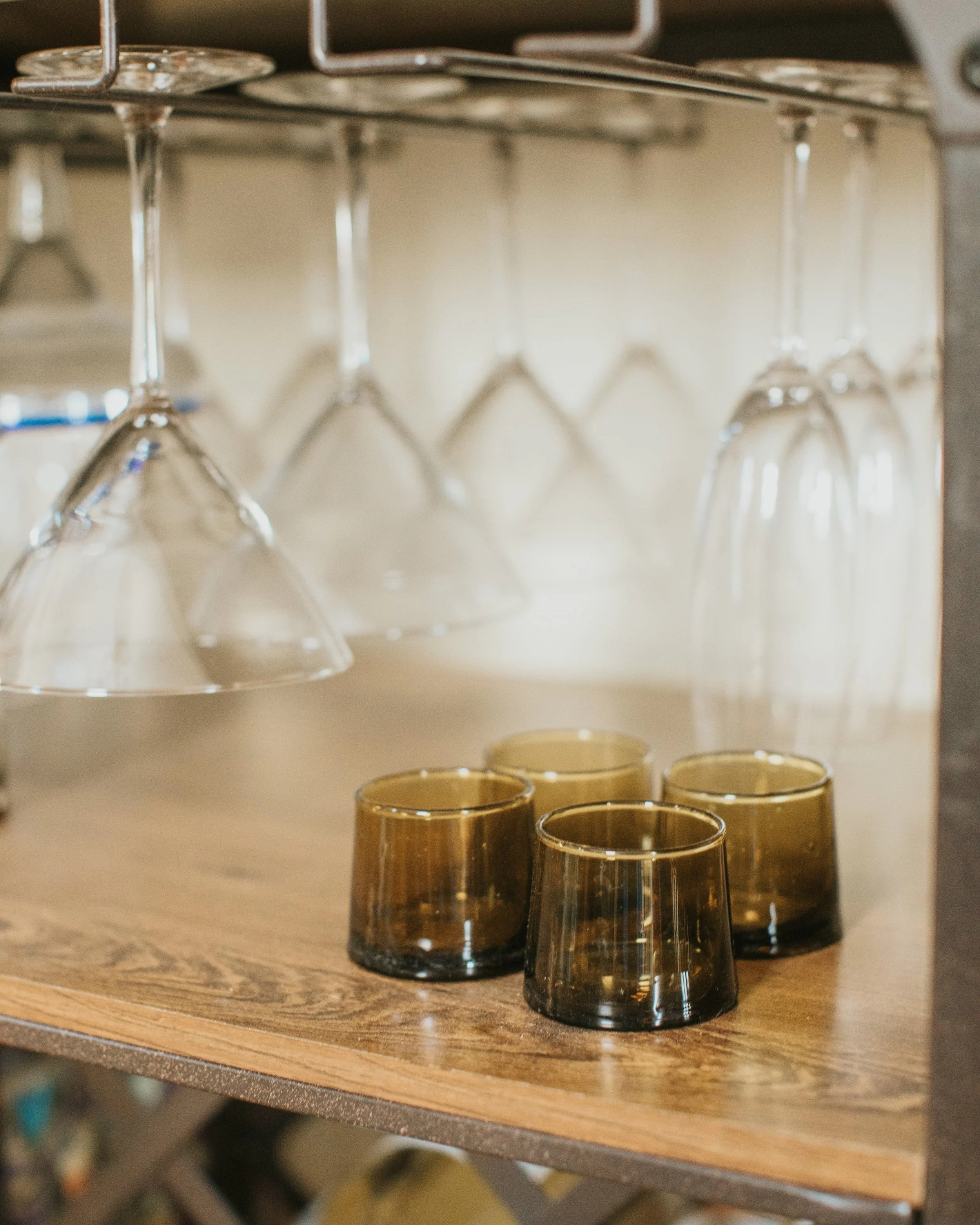 Amber hand-blown Moroccan tea glasses that double as cocktail glasses.