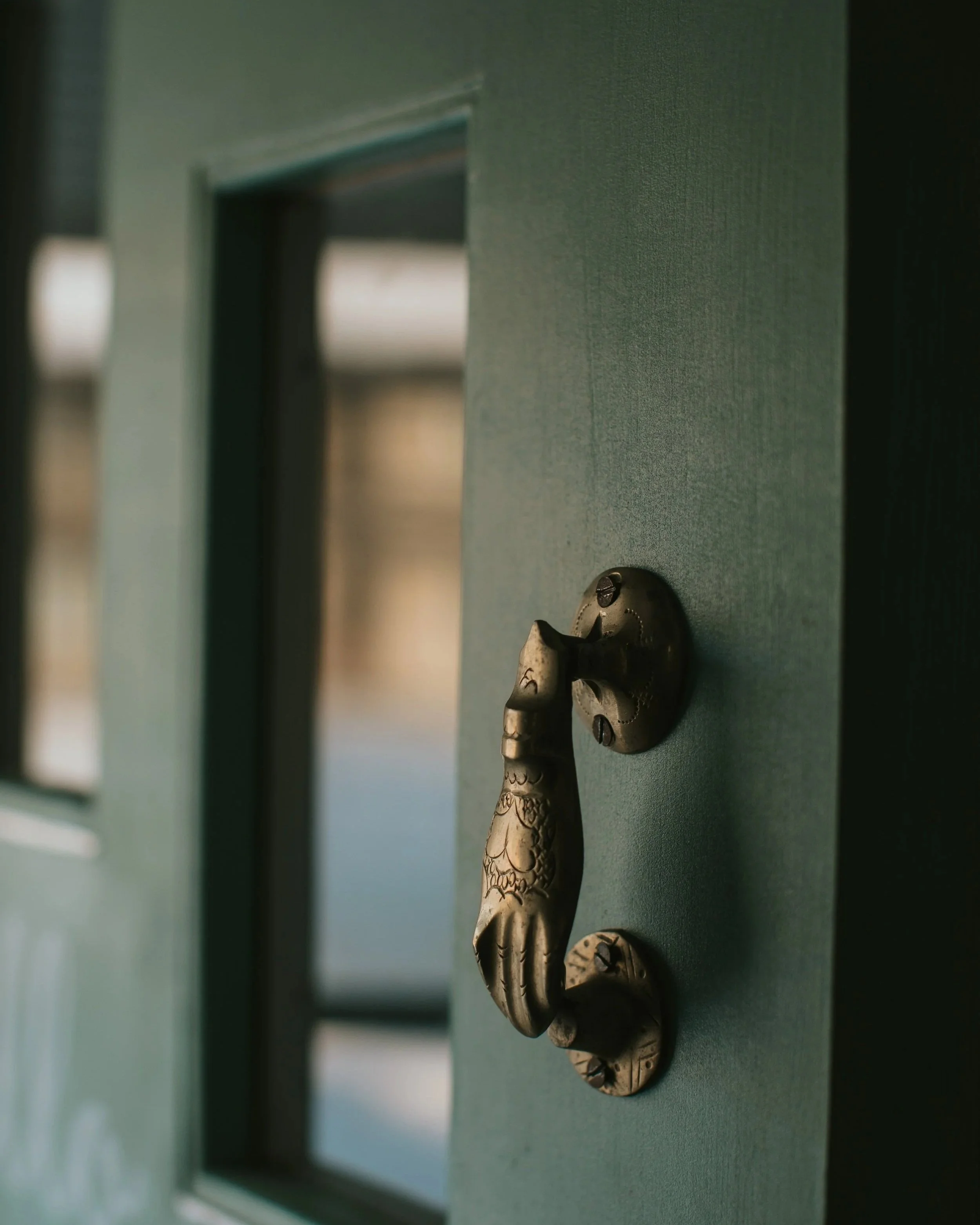 Handcrafted brass door knocker, one of my favorite Marrakech souvenirs from the metalwork souks.