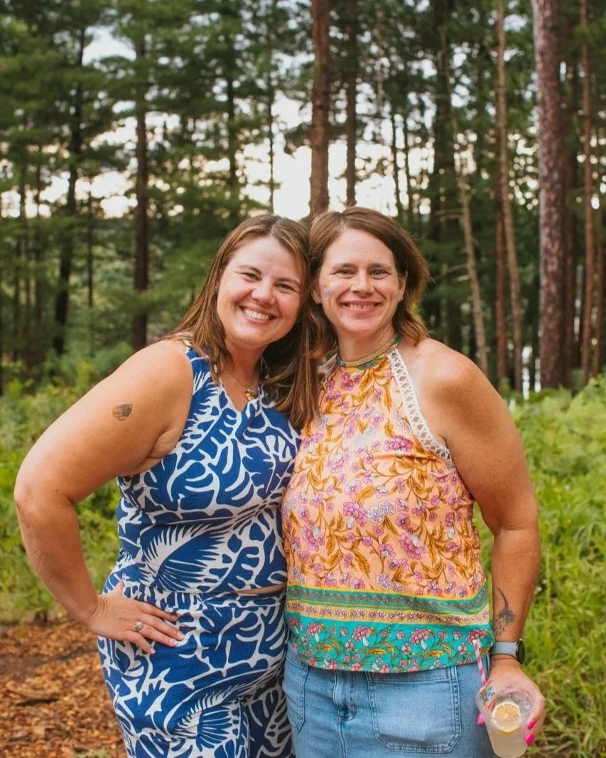 two women who met as roommates at Camp Lola Whiskey adult summer camp in Hayward Wisconsin
