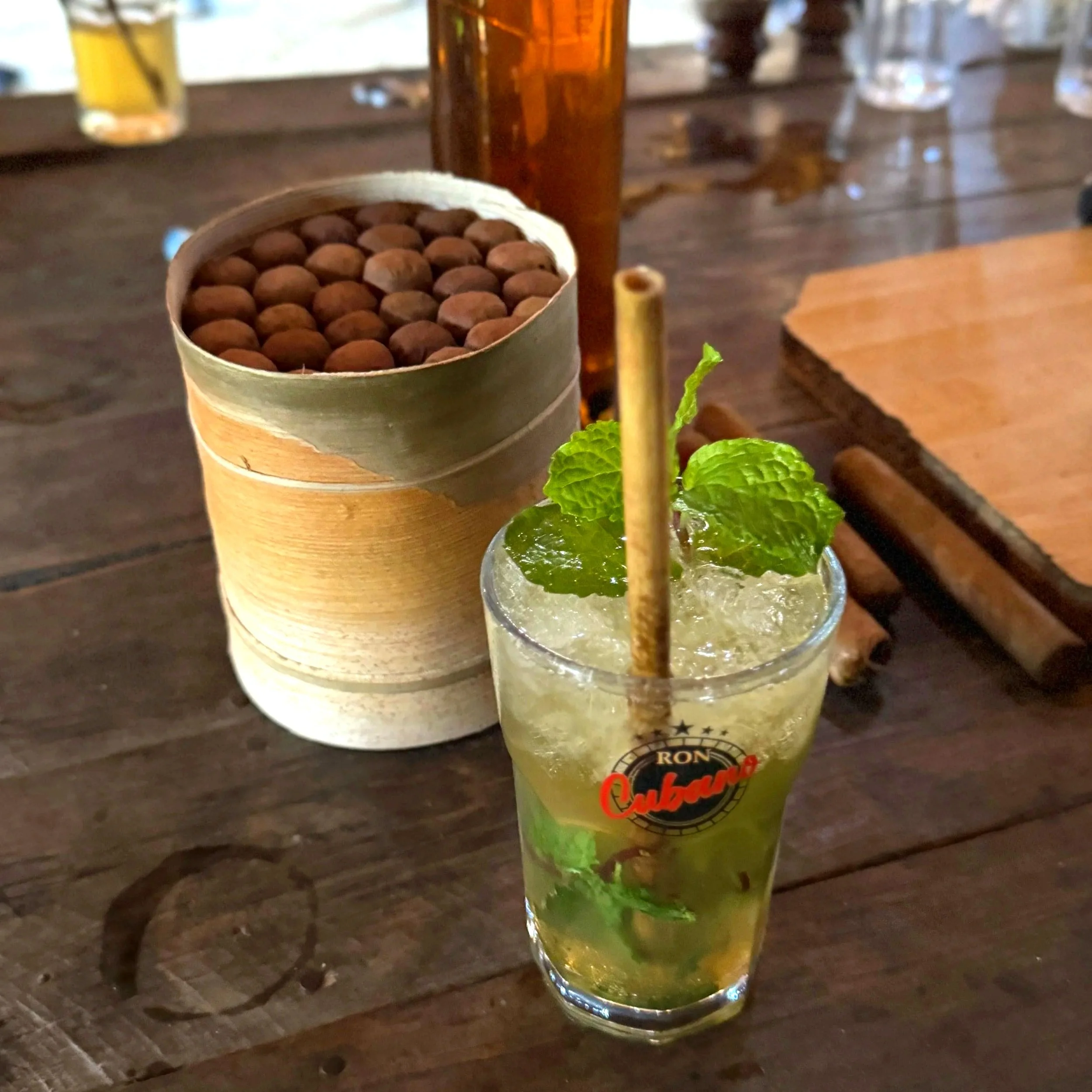 A cuban mojito and cigars on a tobacco farm in Cuba