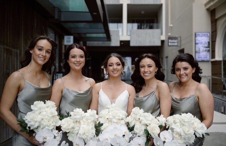 sage dresses white flowers team bride