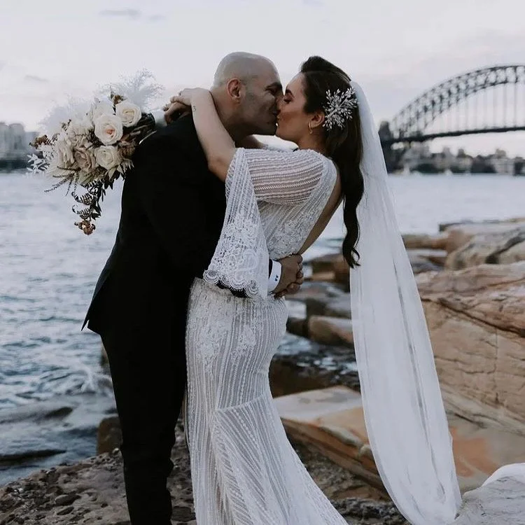 husband and wide kiss