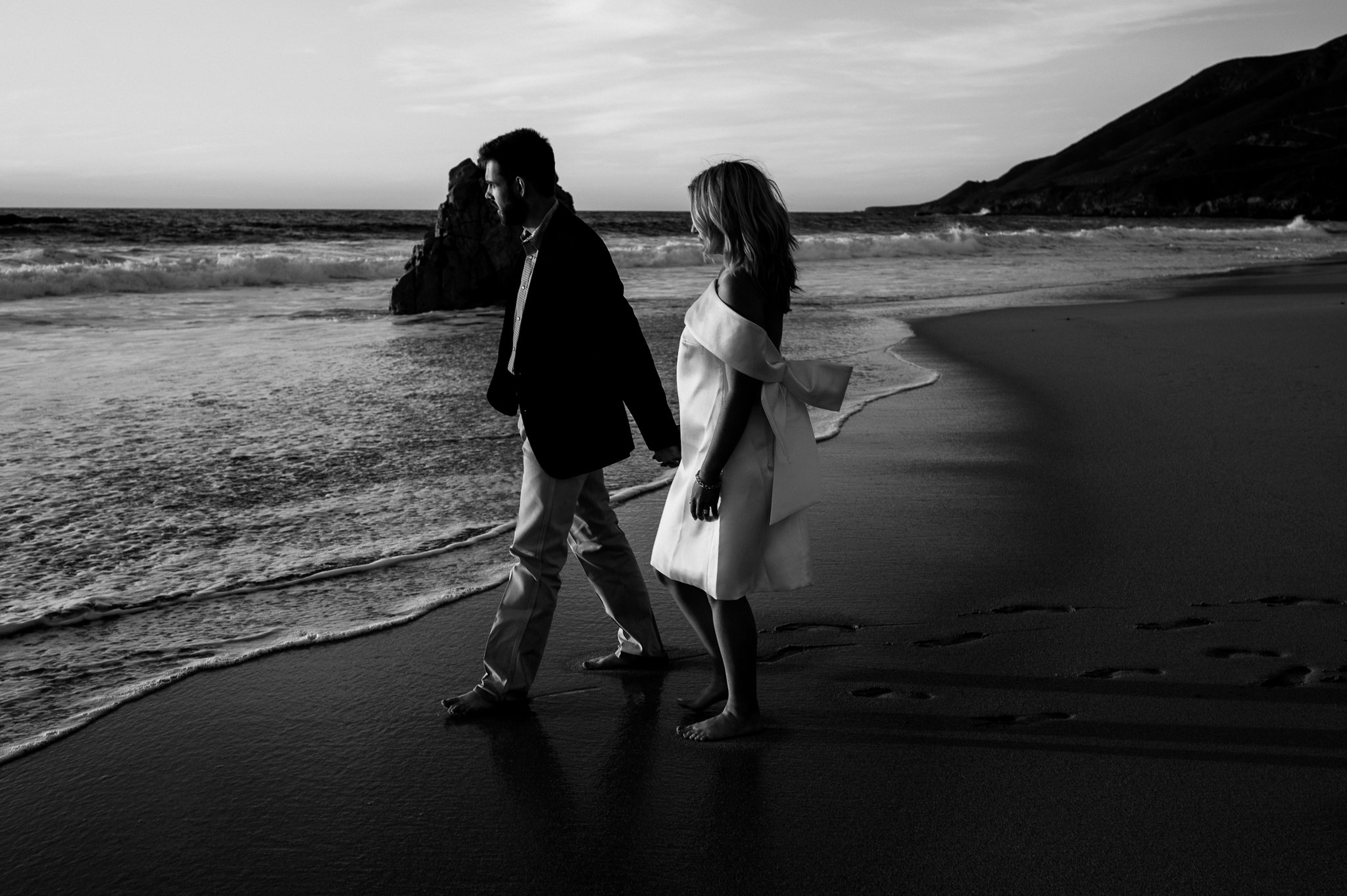 Couple-walking-Big-Sur-Garrapata-beach-engagement