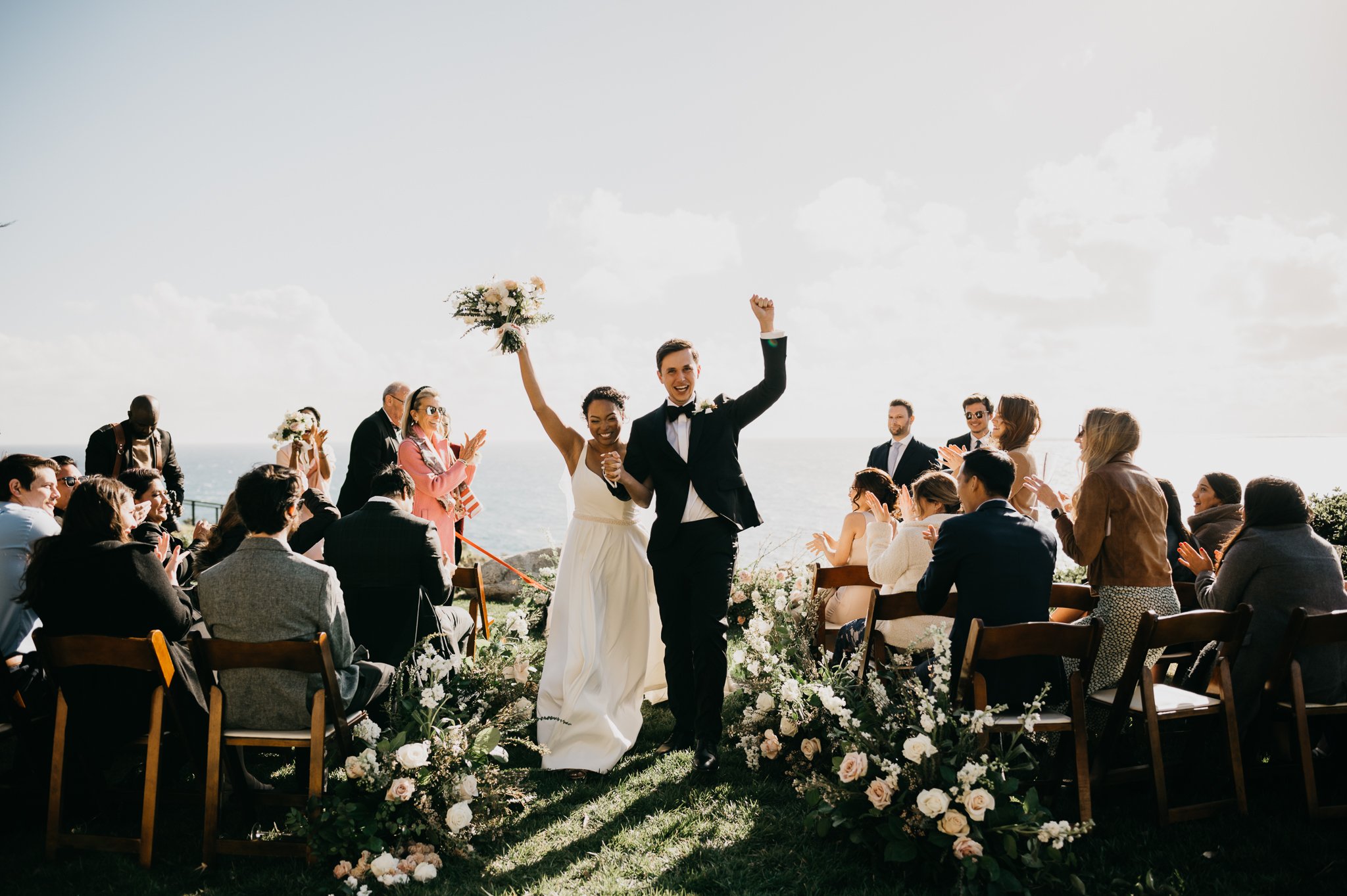 Big-Sur-California-cliffside-wedding-ceremony-at-Wind-and-Sea-happy-bride-and-groom