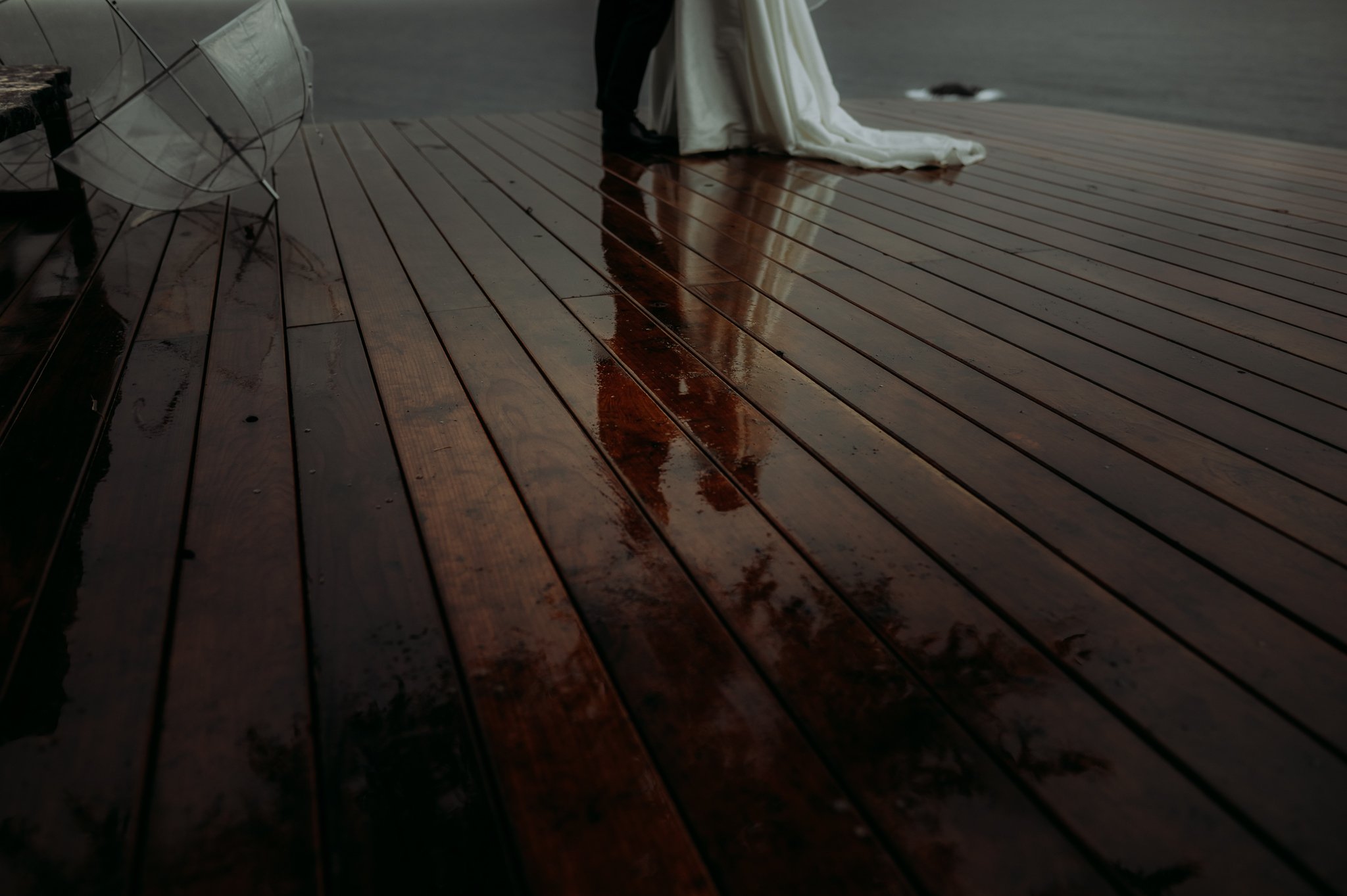 Wind-and-Sea-Wedding-bride-groom-on-deck-overlooking-Pacific-Ocean