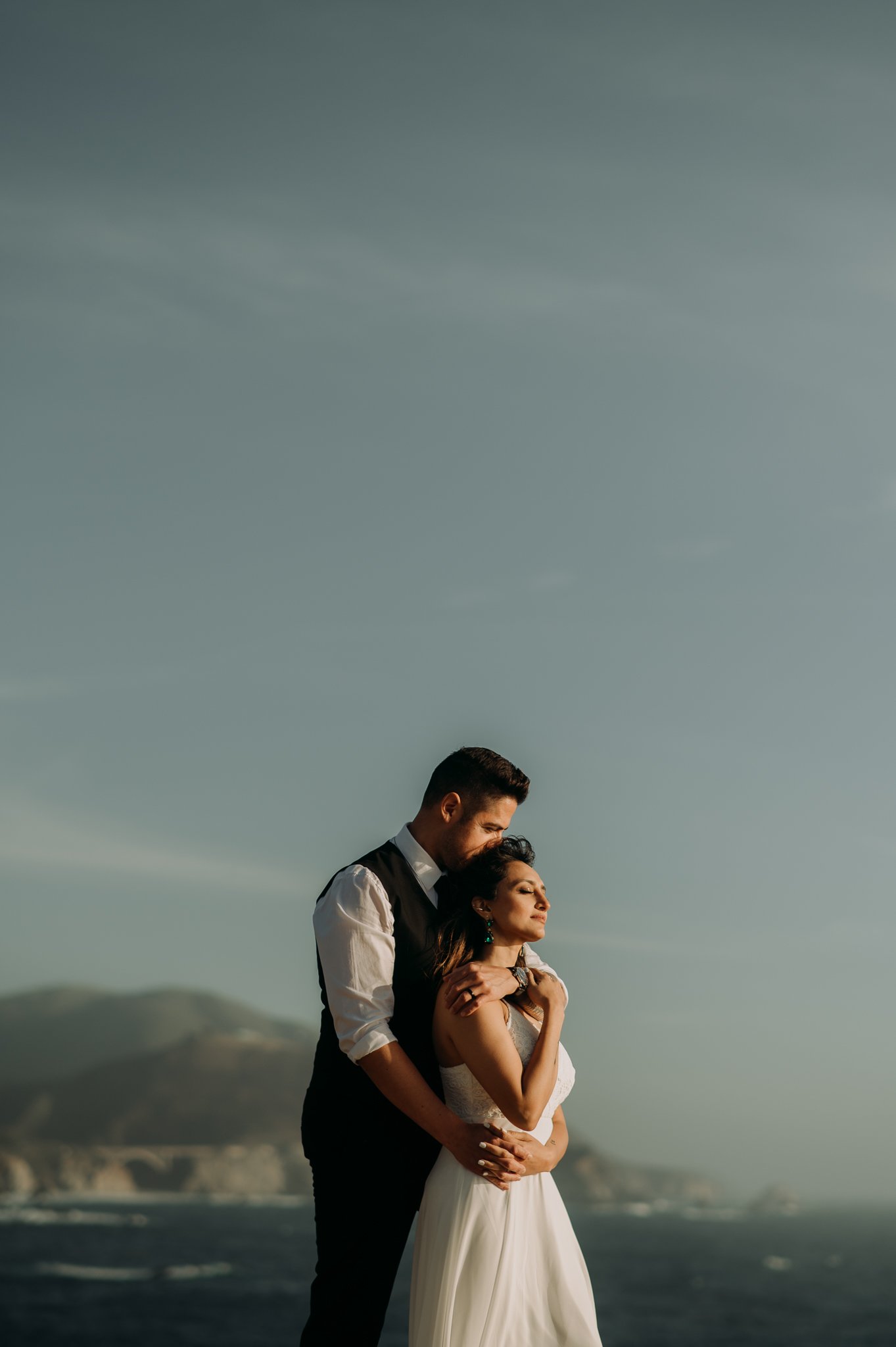 newly married couple in Big Sur at sunset