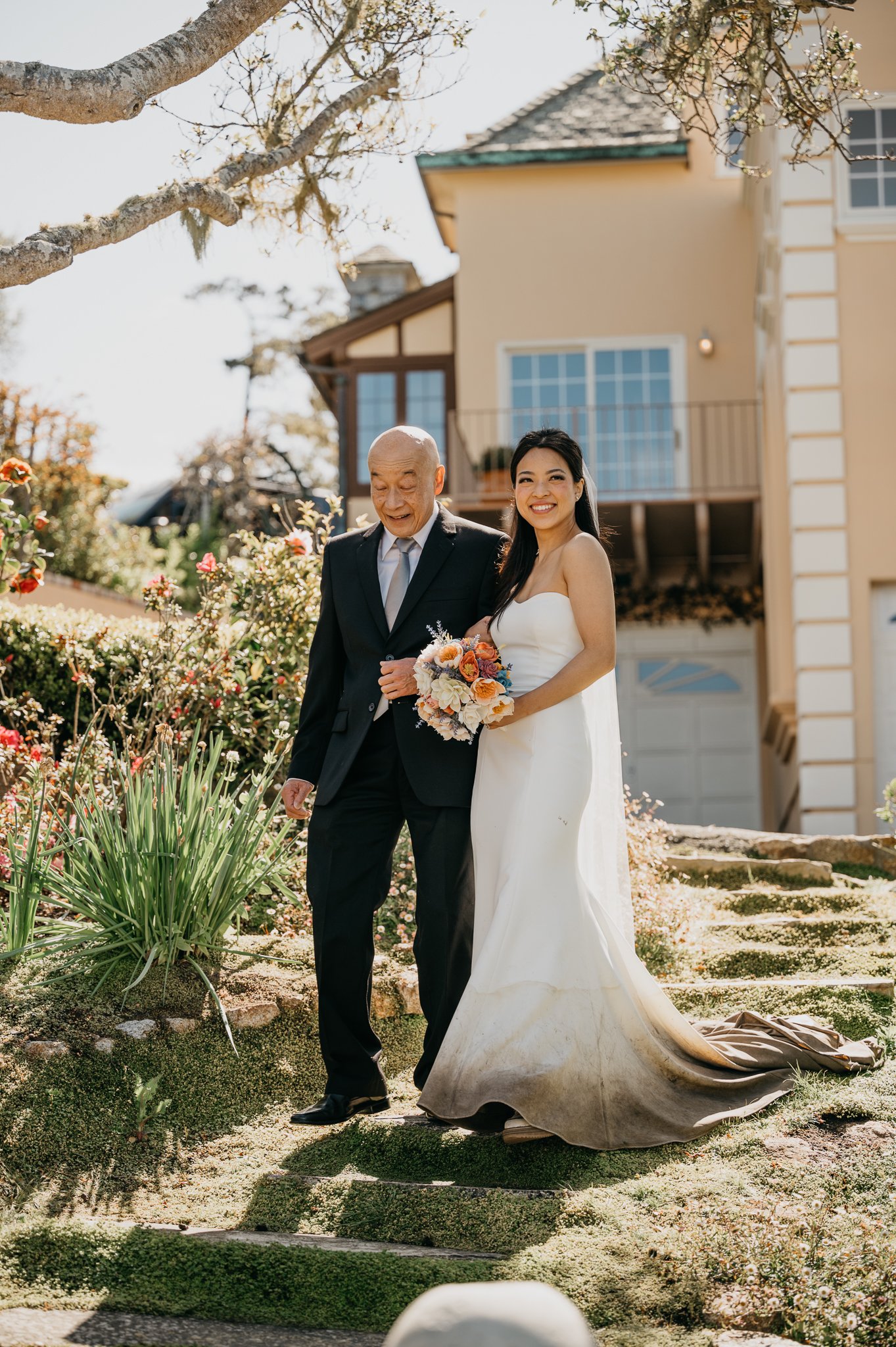 Bride and father walking down aisle at ceremony Pebble Beach, California