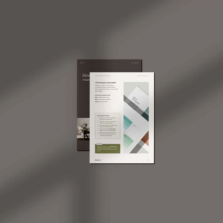 Overlapping documents of free guide on creating a brand with one showing a colour palette guide and checklist on a gray background.