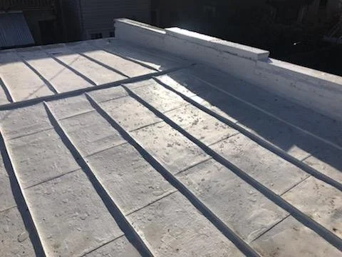 Silicone sealant and metal capped walls