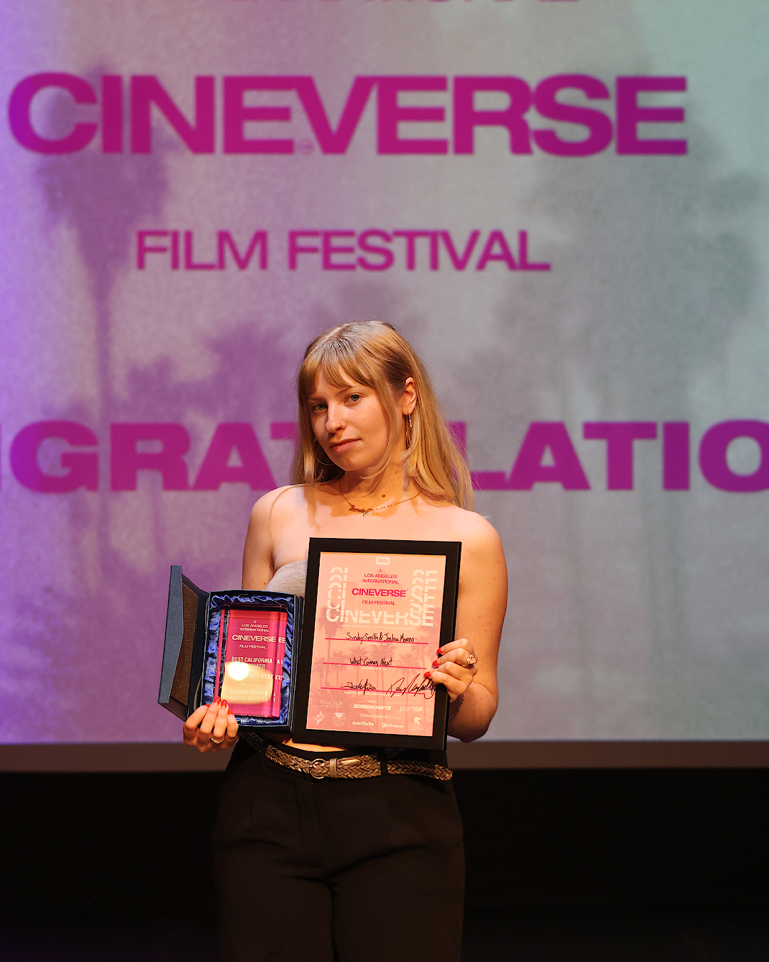 Sunday with Certificate and Trophy 2.png