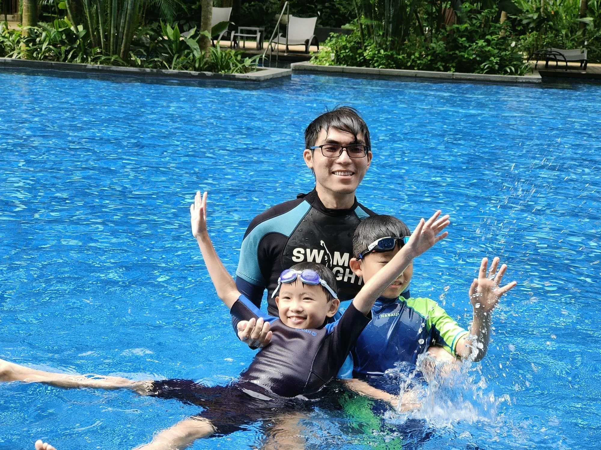 Child enjoying a positive and supportive swimming lesson