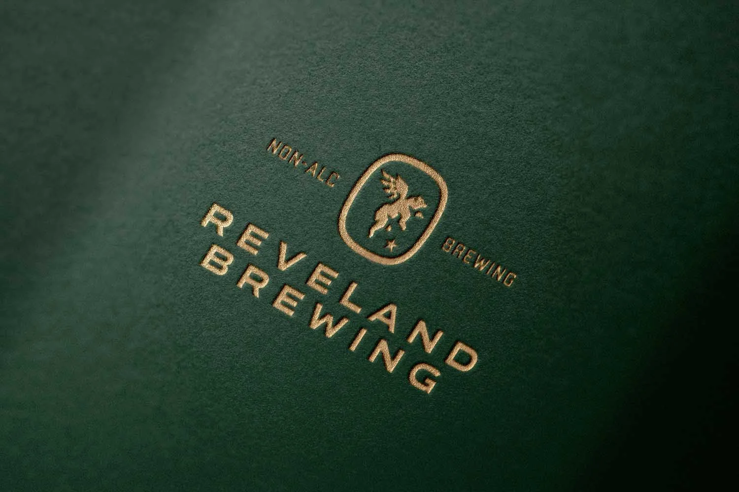Reveland-NA-Beer_Non-Alcoholic-Beer-Branding_Can-Design_Logo-Gold_CreatureTheory.jpg