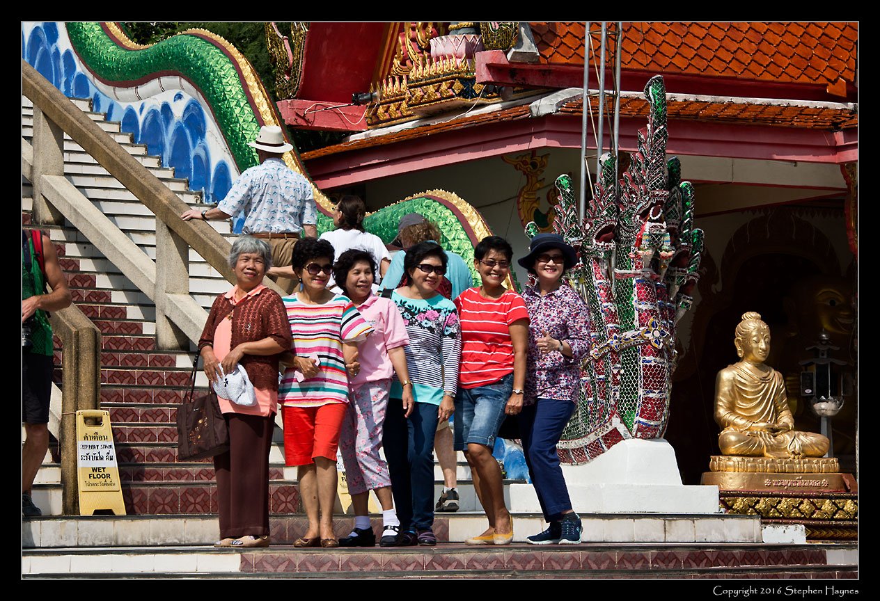 Koh Samui, Thailand --
Tourists at the foot of the staircase leading up to the Big Buddha.