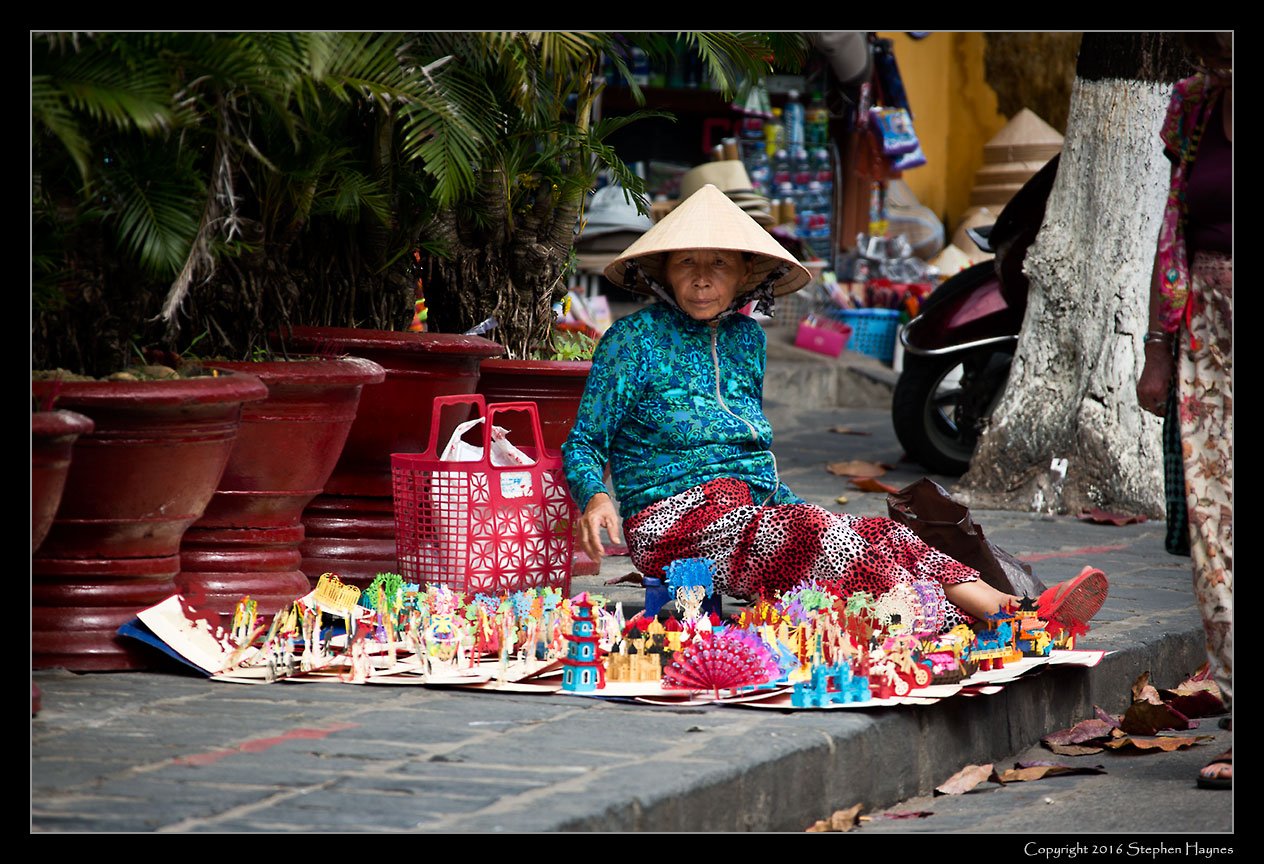 Hoi An, Vietnam --
Street merchant. These pop-up cards were ubiquitous.
