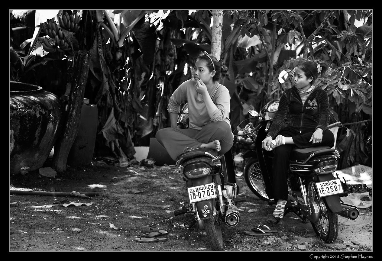 A Pepper Plantation, On the road east from Sihanoukville, Cambodia --
Young women relaxing.
