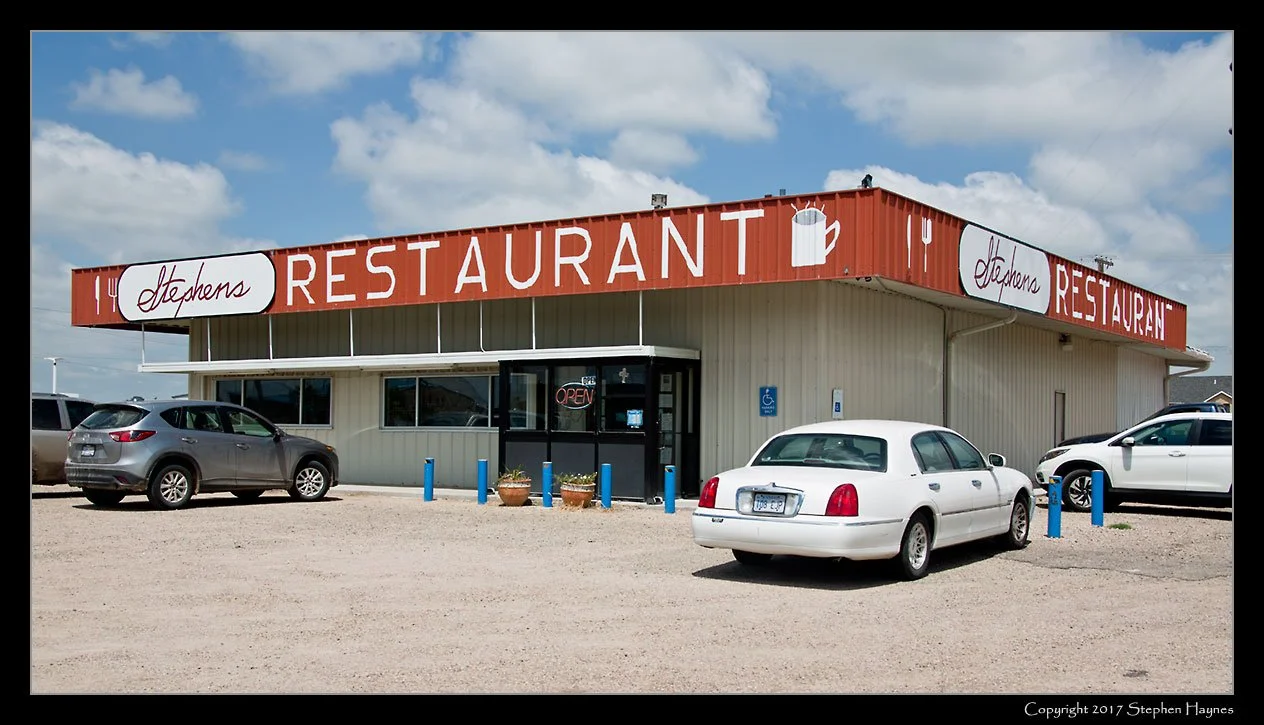 Sharon Springs, Kansas
Aside from the fact it seemed to be the only decent restaurant
within a reasonable drive, how could I resist a restaurant named
"Stephens"? Since dog Suki was in the car, and the day was sunny
and hot, I asked them to make a
