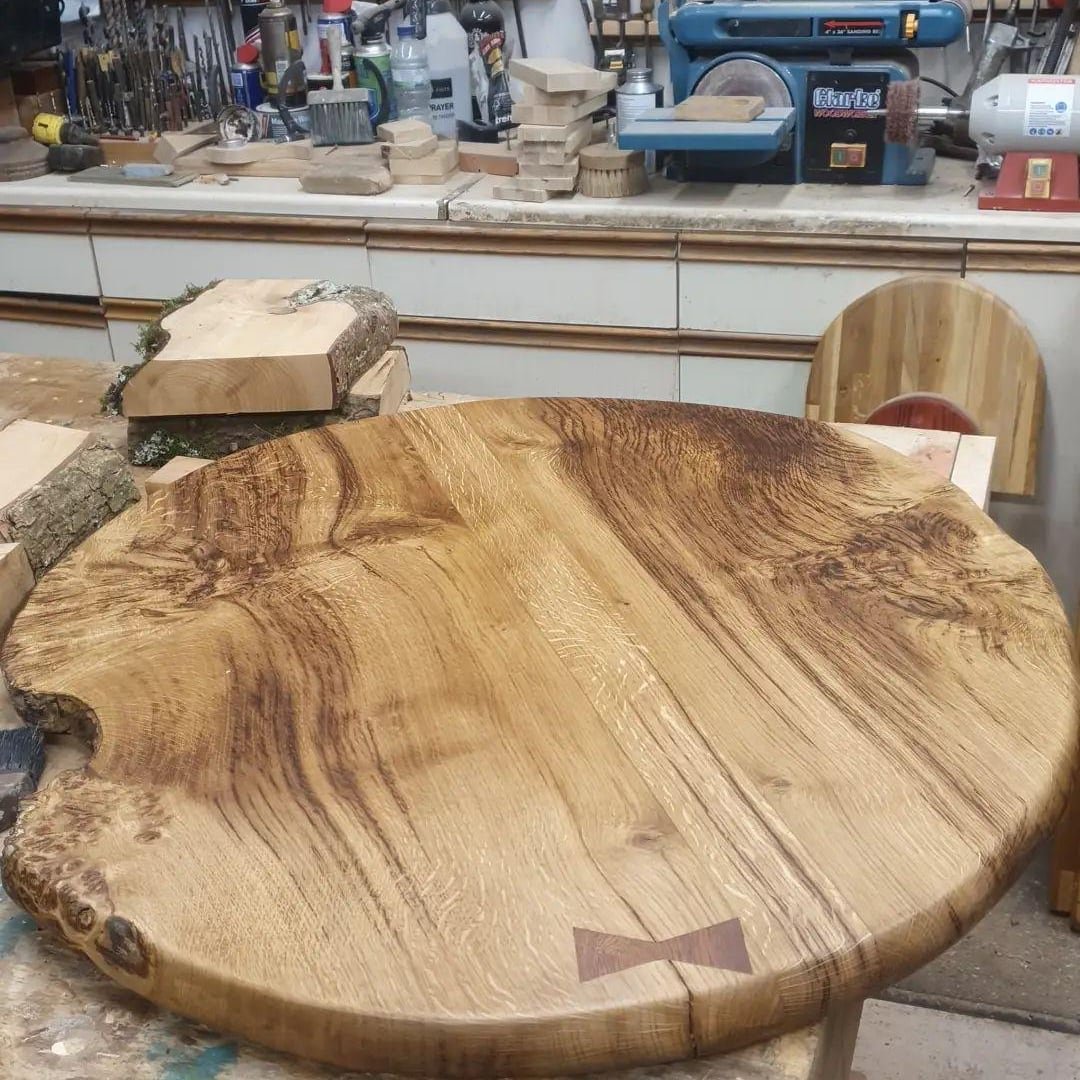 "I was asked to take a look at some tables in need of repair at The Lost Kitchen in Chettiscombe. The joints had parted and the varnish surface was delaminating. Once back at the Hill workshop they were gently taken apart and the varnish and old glue
