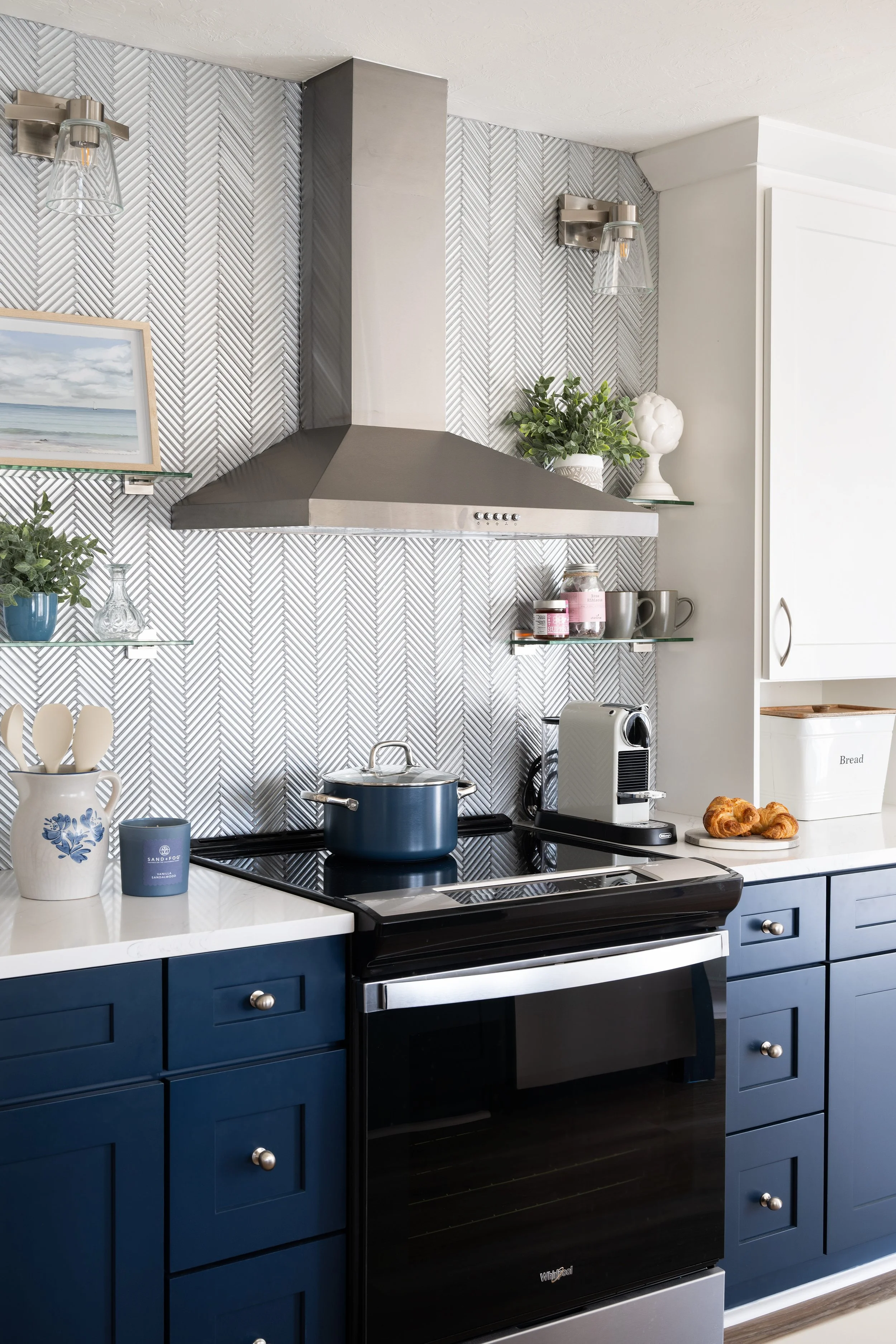 Client Love- Ocean-blue cabinetry, shimmering chevron glass tile & coastal accents